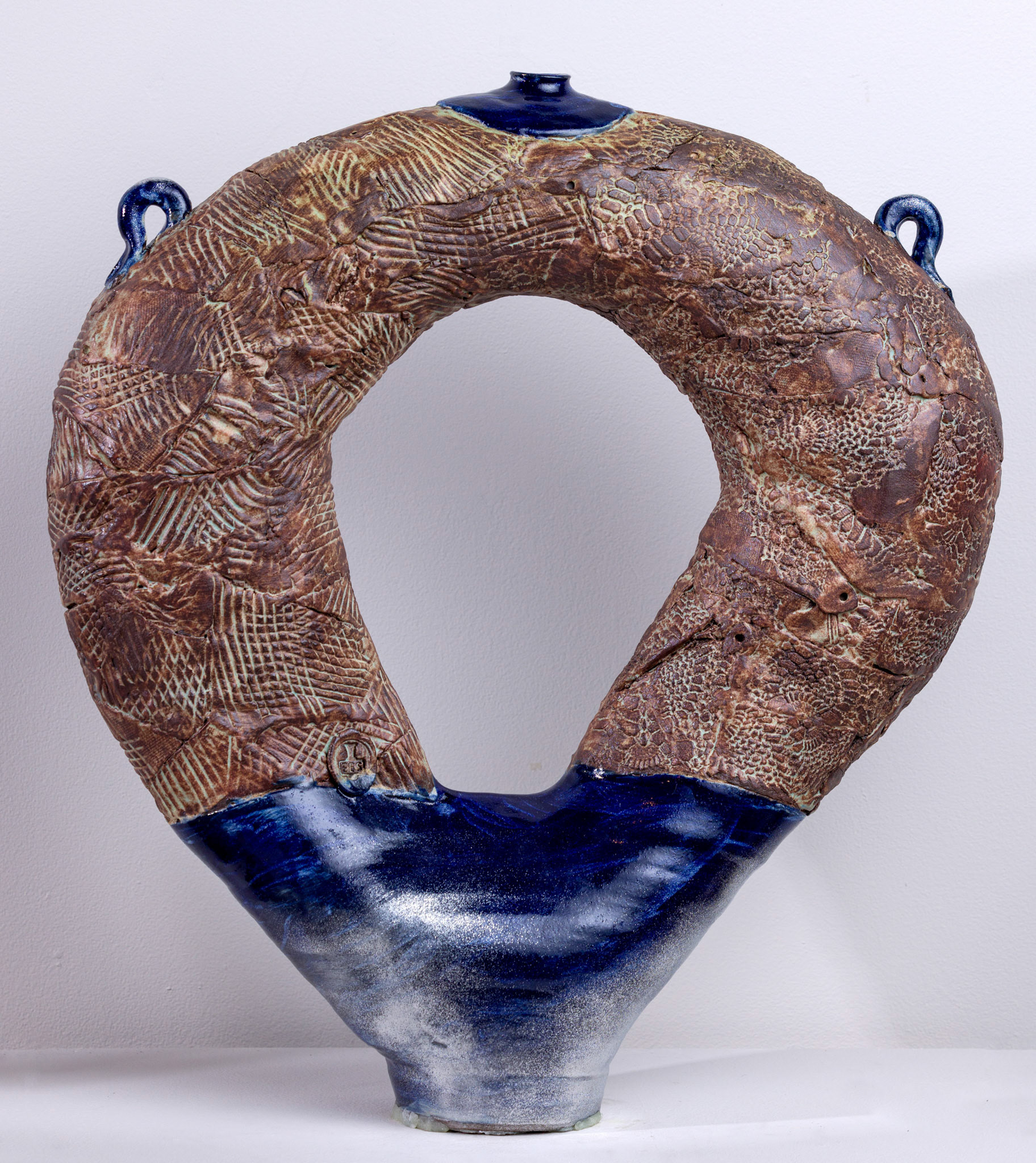 Masters Vessel Stoneware with Glaze, 29” x 10” x 8”, 2023 of the Two Houses, Stoneware with Glaze and Wood Stain 24” x 22” x 7” 2024