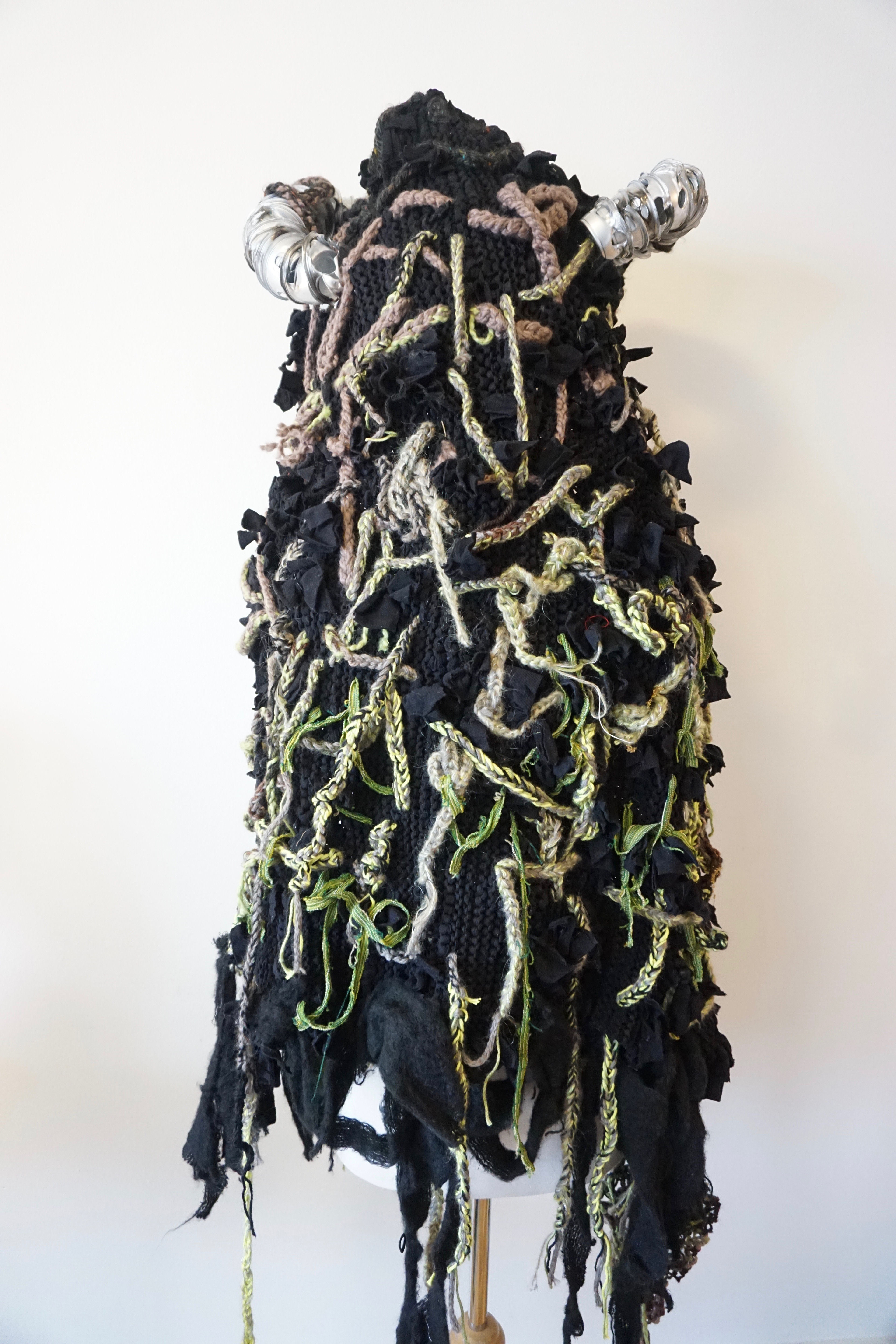 Oberon's headdress, upcycled stockings, yarn, painted condiment cups, wire; design and construction by AK, 2018