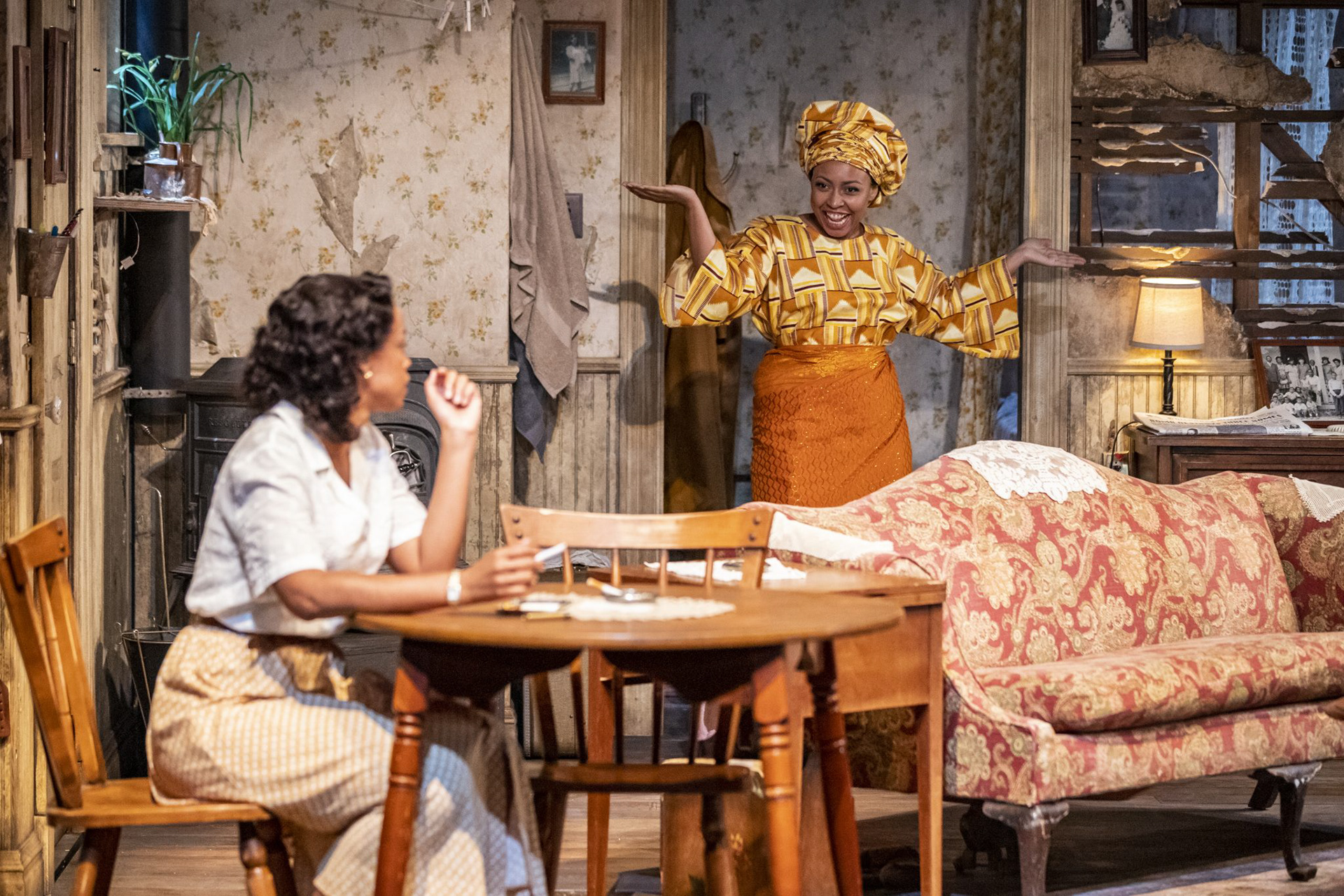 Traditional head wrap (gele). Mandi Masden and Nikiya Mathis in A Rasin in the Sun at the Williamstown Theatre Festival, 2019. Costume design by Alice Tavener.Photo by Joseph O'Malley