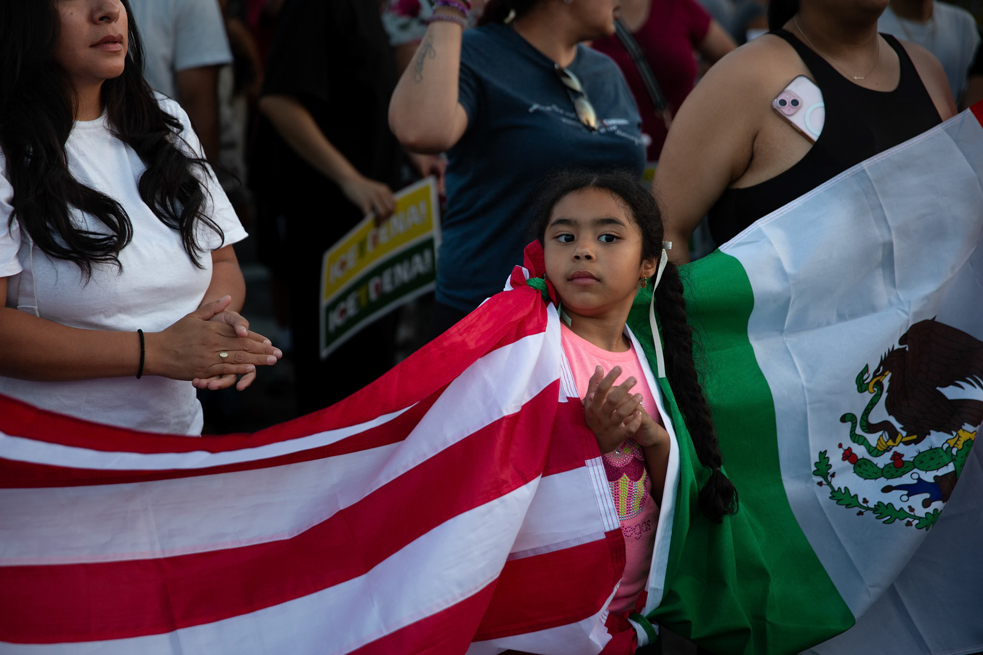 Residents and clergy gather in Pasadena, Calif. on June 18, 2025 to demonstrate against immigration raids conducted by ICE and Federal police.