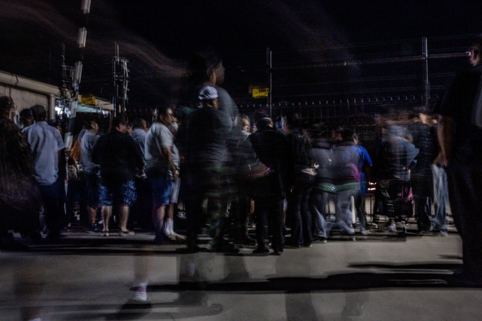 Families anxiously wait for their loved ones to come out of the farm facility after a mass immigraiton raid condicted by ICE and multiple DHs agencies in Camarillo, Calif. on July 10, 2025