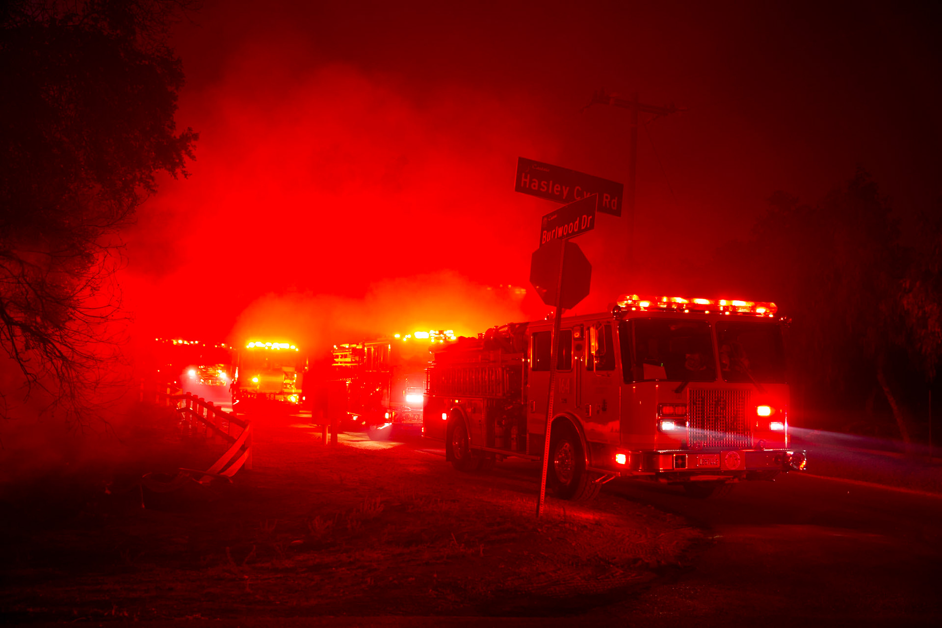 Firefi Engines lineup in Hasley Canyon in Santa Clarita, Calif. The Canyon Fire started around 1:30pm on August 7, 2025 and rapidly spread to 600 acres in less than two hours. Aided by the heatwave in Southern California that reached 100 degrees Ferehnehit, dry vegetation, and steep topology; the fire has scorched more than 4,800 acres as of Thursday night.