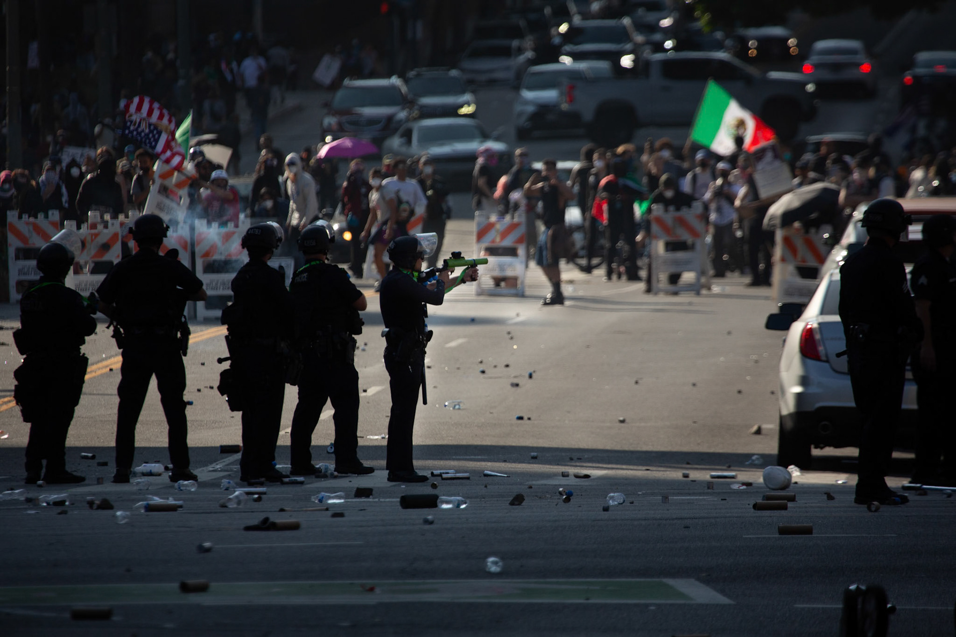 LAPD officers fire rubber bulets and tear gas into the crowd in Donwtown Los Angeles, Calif. on June 8, 2025 during a protest against immigration raids conducted by ICE and Federal police.
