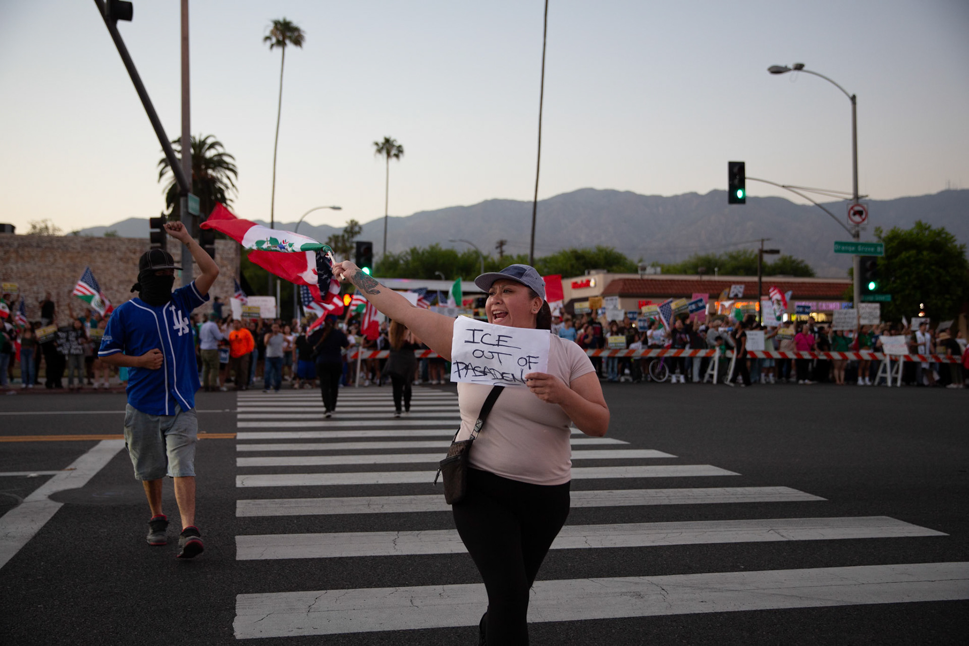 Residents and clergy gather in Pasadena, Calif. on June 18, 2025 to demonstrate against immigration raids conducted by ICE and Federal police.