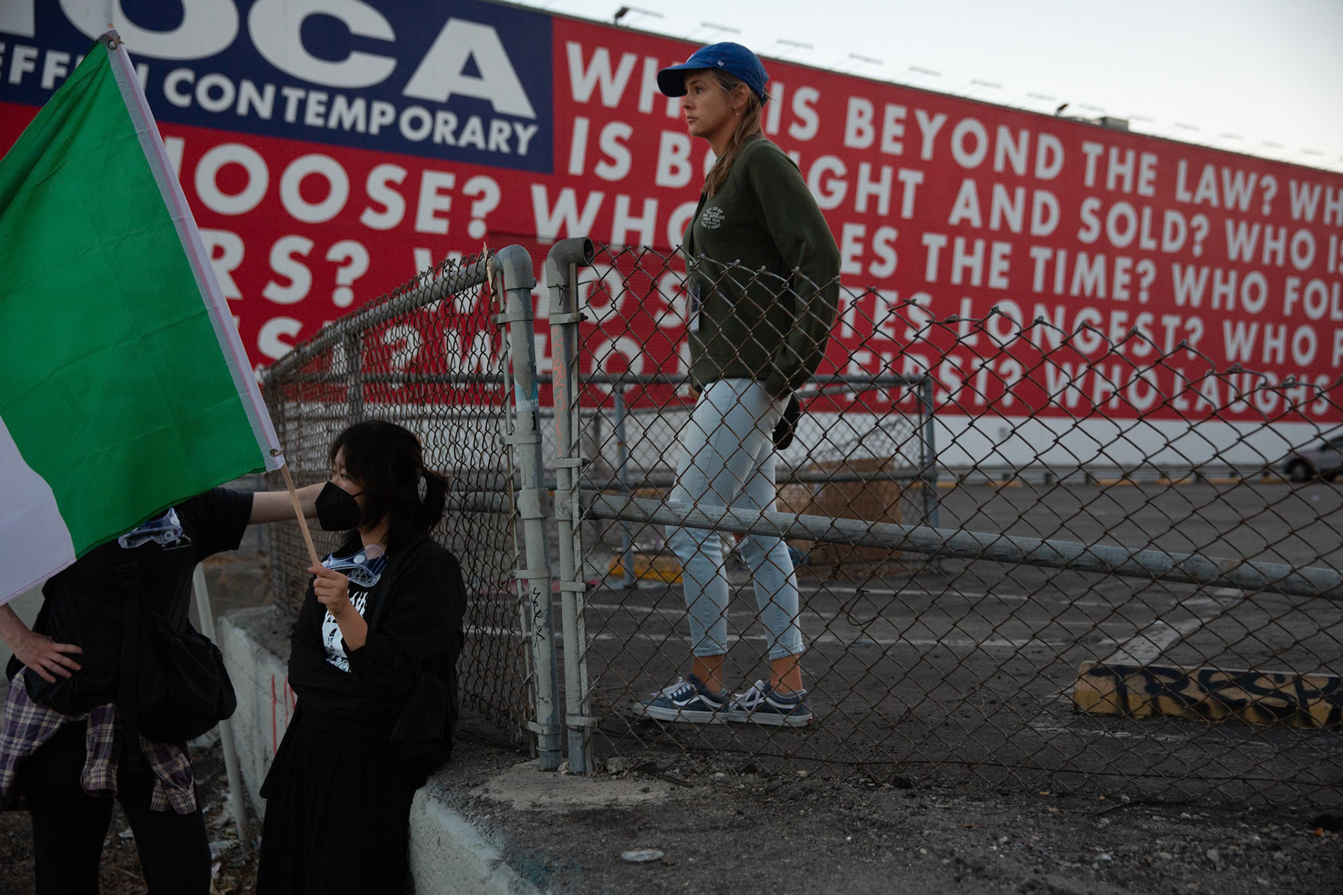 Demonstrators in the parking lot of the Museum of Contemporary Art in Downtown Los Angeles on June 13, 2025 after a demonstration against immigration raids by ICE.
