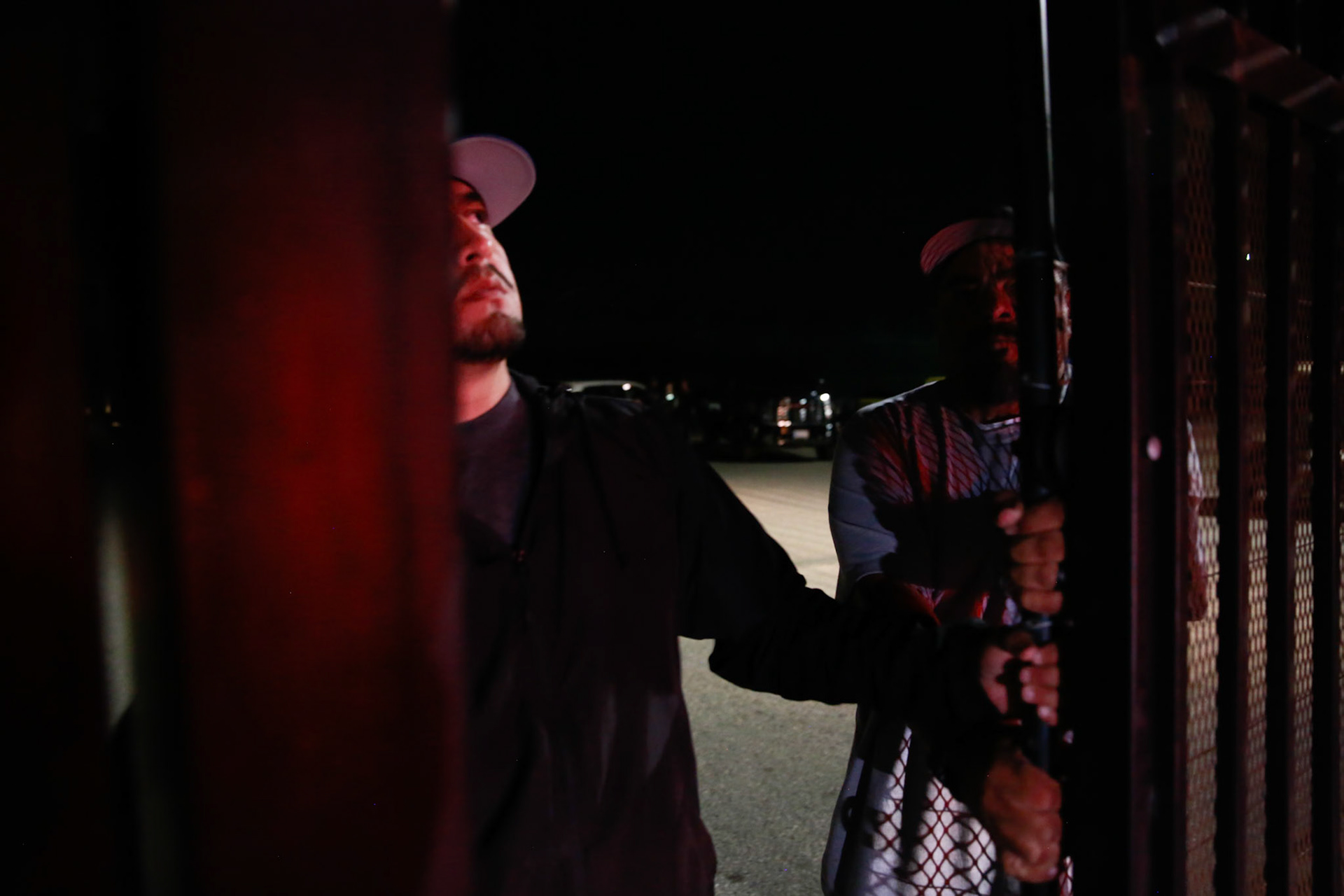 Farm workers man the gate so workers can leave the facility after a mass immigraiton raid condicted by ICE and multiple DHs agencies in Camarillo, Calif. on July 10, 2025