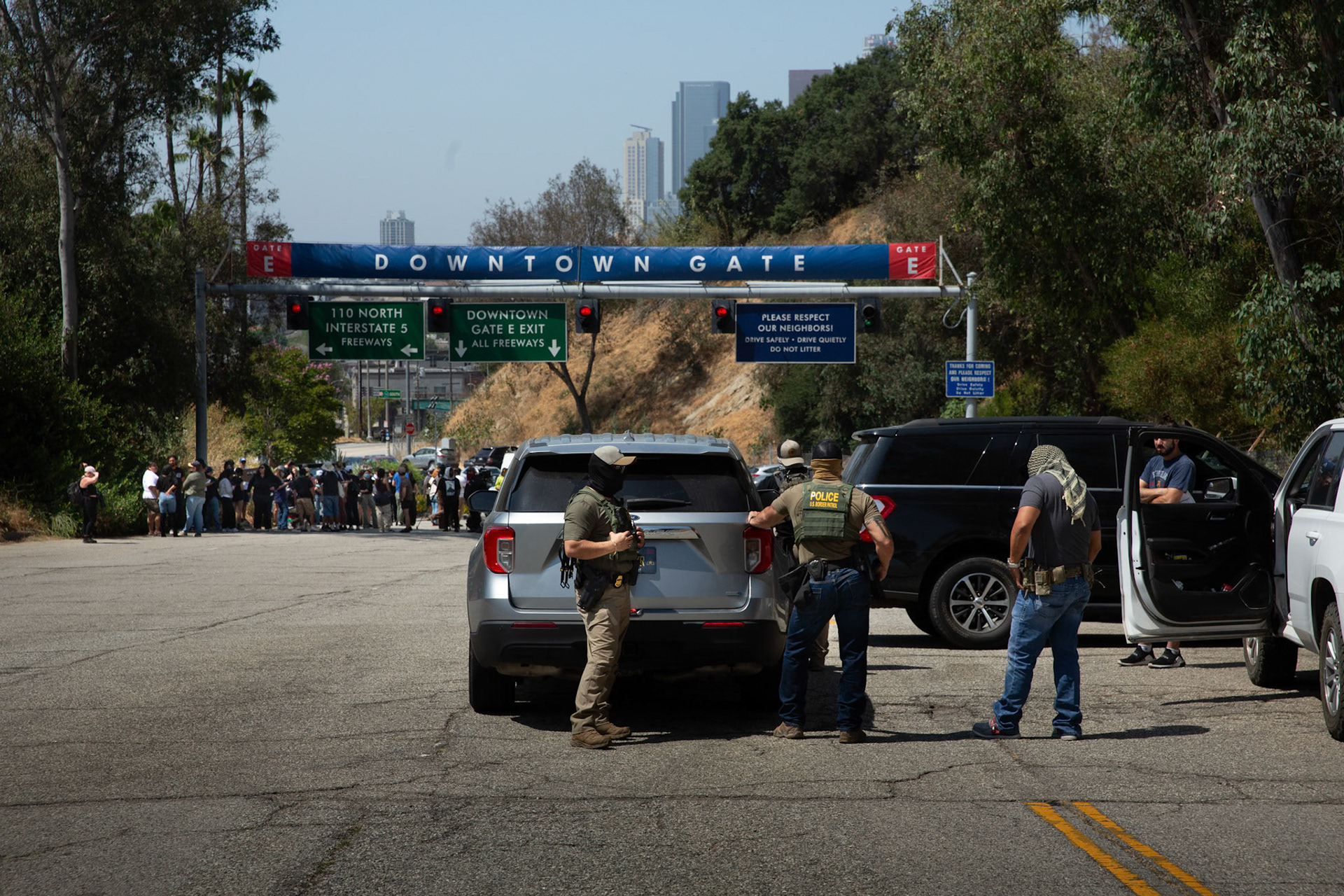 Border Patrol agents atr trapped at Gate E of the Dodgers Stadium in Los Angeles, Calif. while attempting to set up a staging area oon June 19, 2025. A statement from Dodgers Team News website during the stand off states that the Dodgers has denied ICE agents access to the stadium. The Border Patrol agents pictured refuse to identify themselves but says they do not have anyone detained. Dodgers Stadium employees at the gate says they have not helped immigration agents and the stadium policy does not allow immigration agents on the property.
