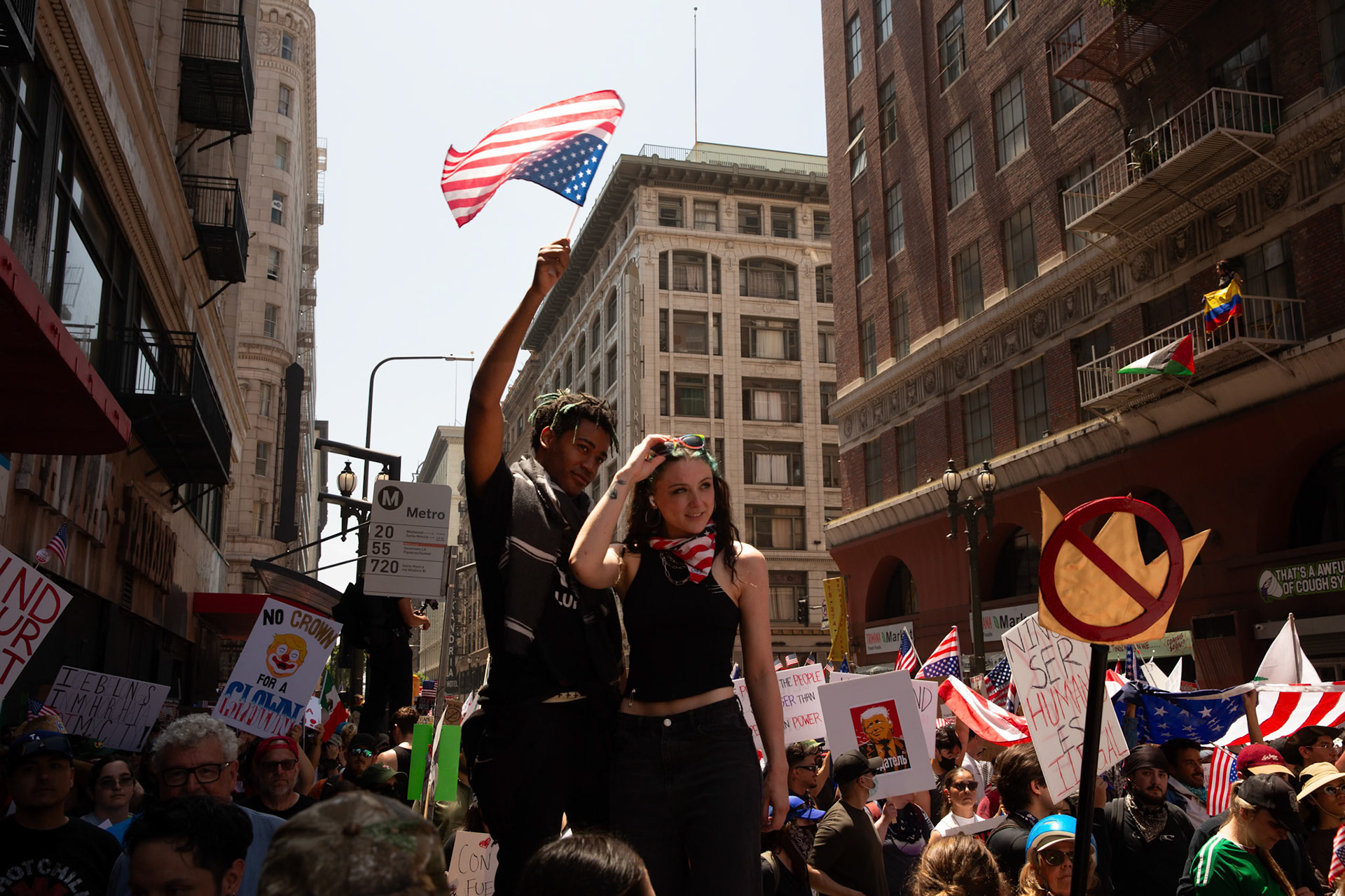 Demonstrators march against the Trump Military Parade and immigration raids by ICE in Downtown Los Angeles on June 13, 2025