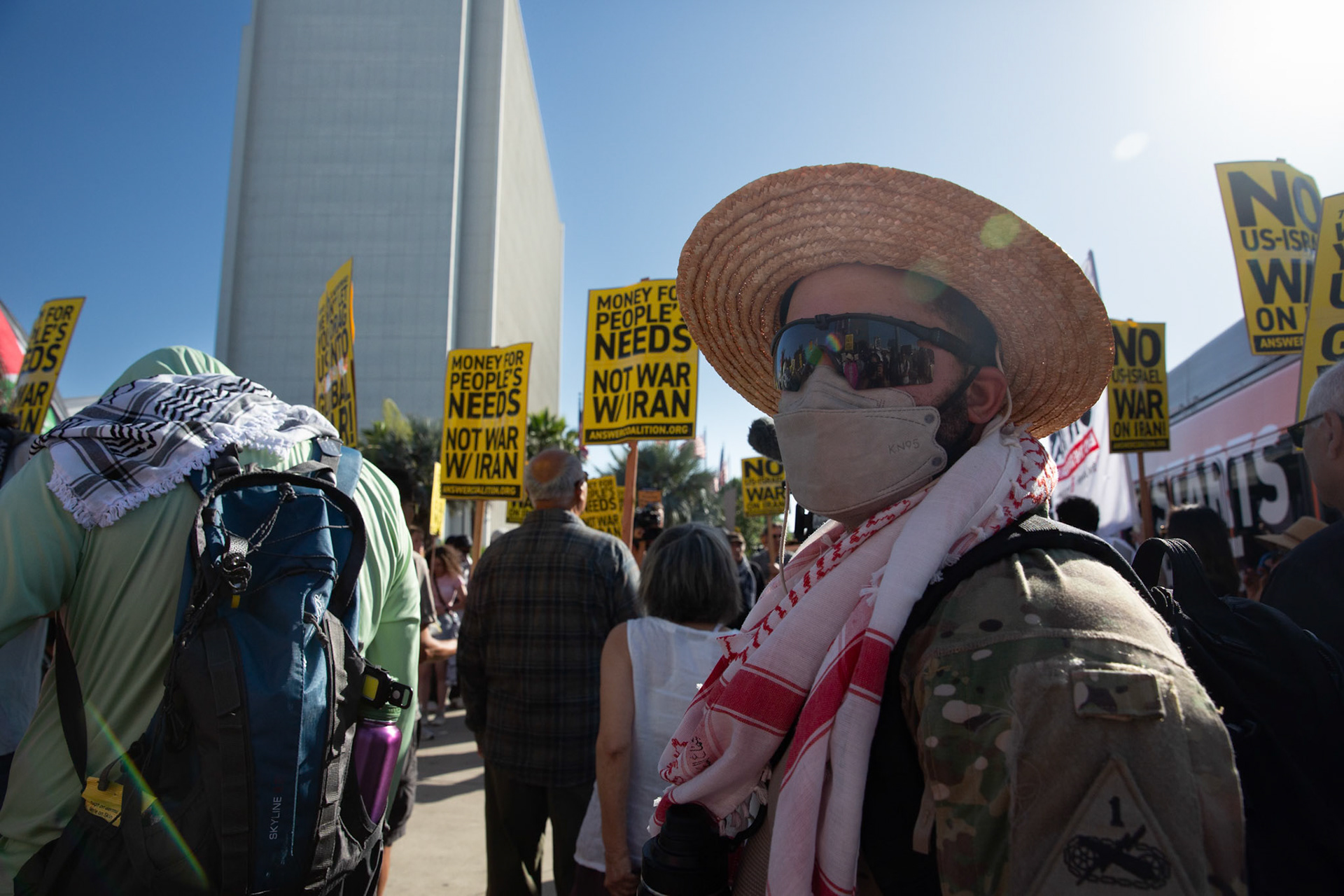 An Army First Armor Division veteran who goes by Tucker after speaking to protestors while United States Marines guard the Federal Building on Wilshire Boulevard in Los Angeles Calif. on June 18, 2025 during a demonstration against U.S. involvement in the war between Israel and Iran. During an interview Tucker recounts seeing the negative impact warfare has on society and the environment during his last deployment. He says his experiene in service made him realize that military intervention has not made the world a safer place urges service members to reach out to The GI Rights Hotline for assistane if they want help becoming conscious objectors.