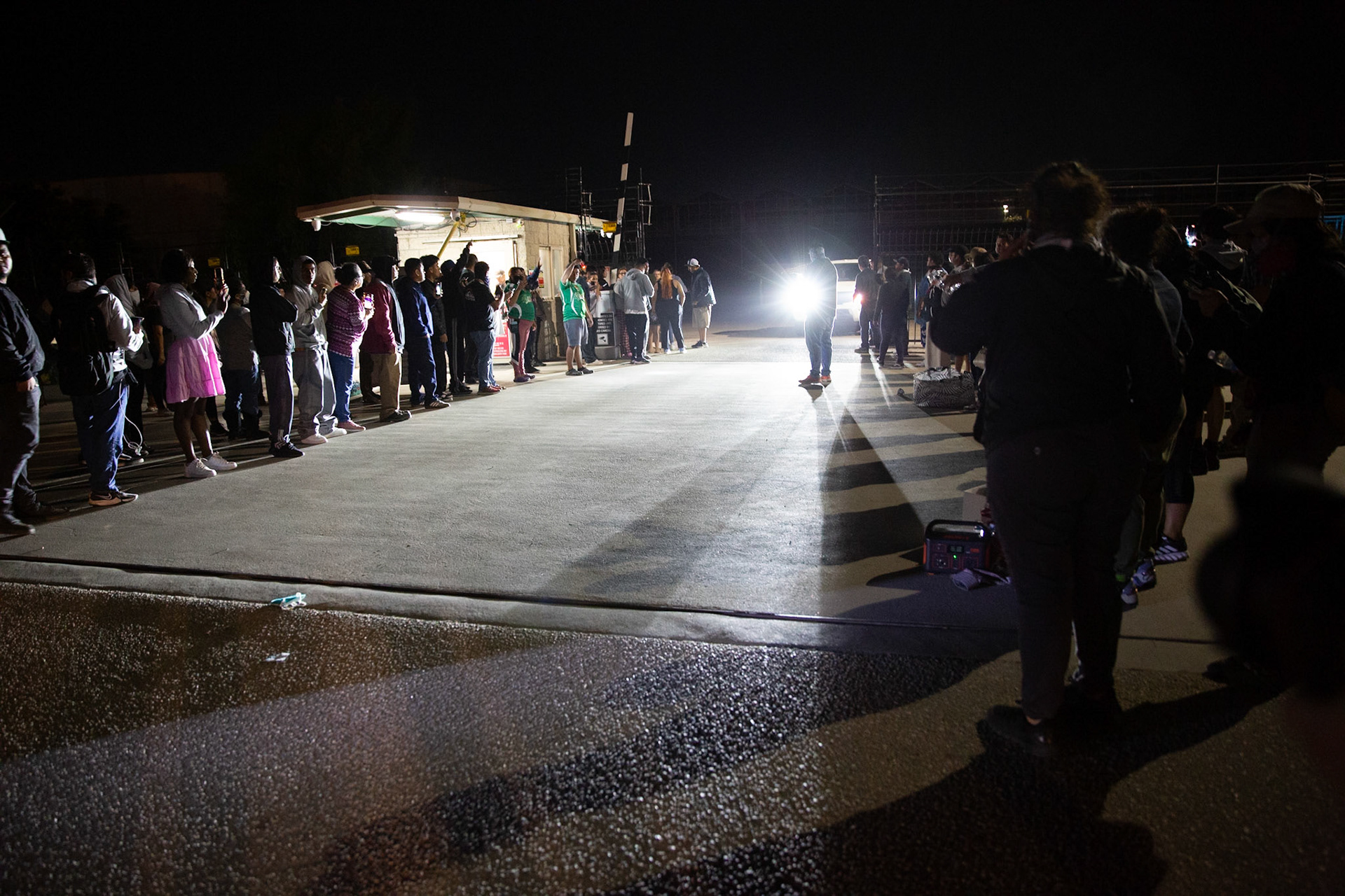 Families anxiously wait for their loved ones to come out of the farm facility after a mass immigraiton raid condicted by ICE and multiple DHs agencies in Camarillo, Calif. on July 10, 2025