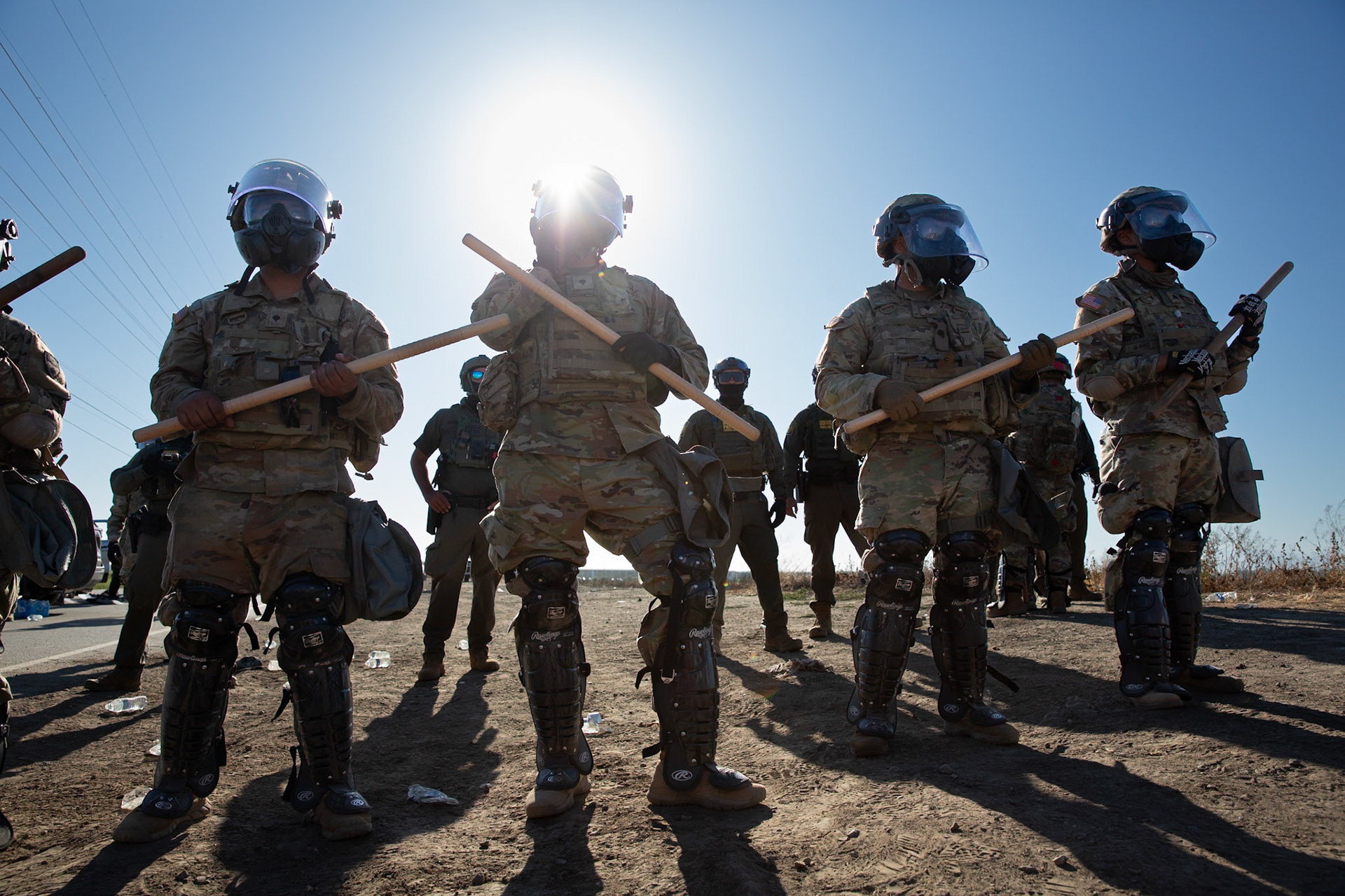 National Guards in riot gear at a farm. DHS agents from multiple subsidiaries conducts a mass raid at a farm in Camarillo, Calif. on July 10, 2025.