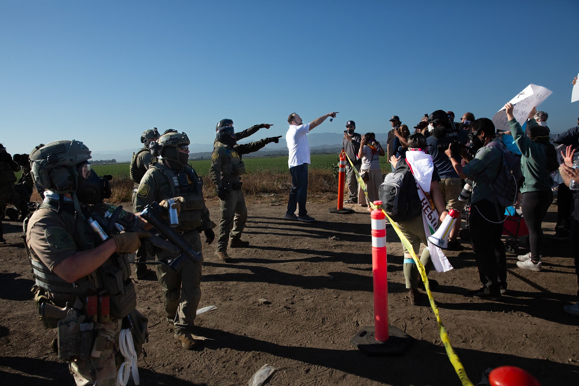 Pro Trump protestor taunts civilians gathered at the farm. DHS agents from multiple subsidiaries conducts a mass raid at a farm in Camarillo, Calif. on July 10, 2025.