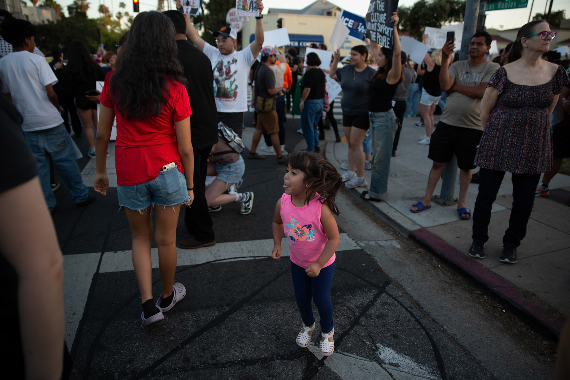 Residents and clergy gather in Pasadena, Calif. on June 18, 2025 to demonstrate against immigration raids conducted by ICE and Federal police.