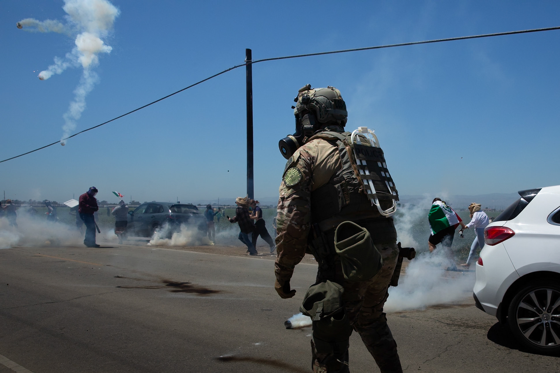 ICE and DHS agents fire tear gas at civilians gathered on a farm. DHS agents from multiple subsidiaries conducts a mass raid at a farm in Camarillo, Calif. on July 10, 2025.