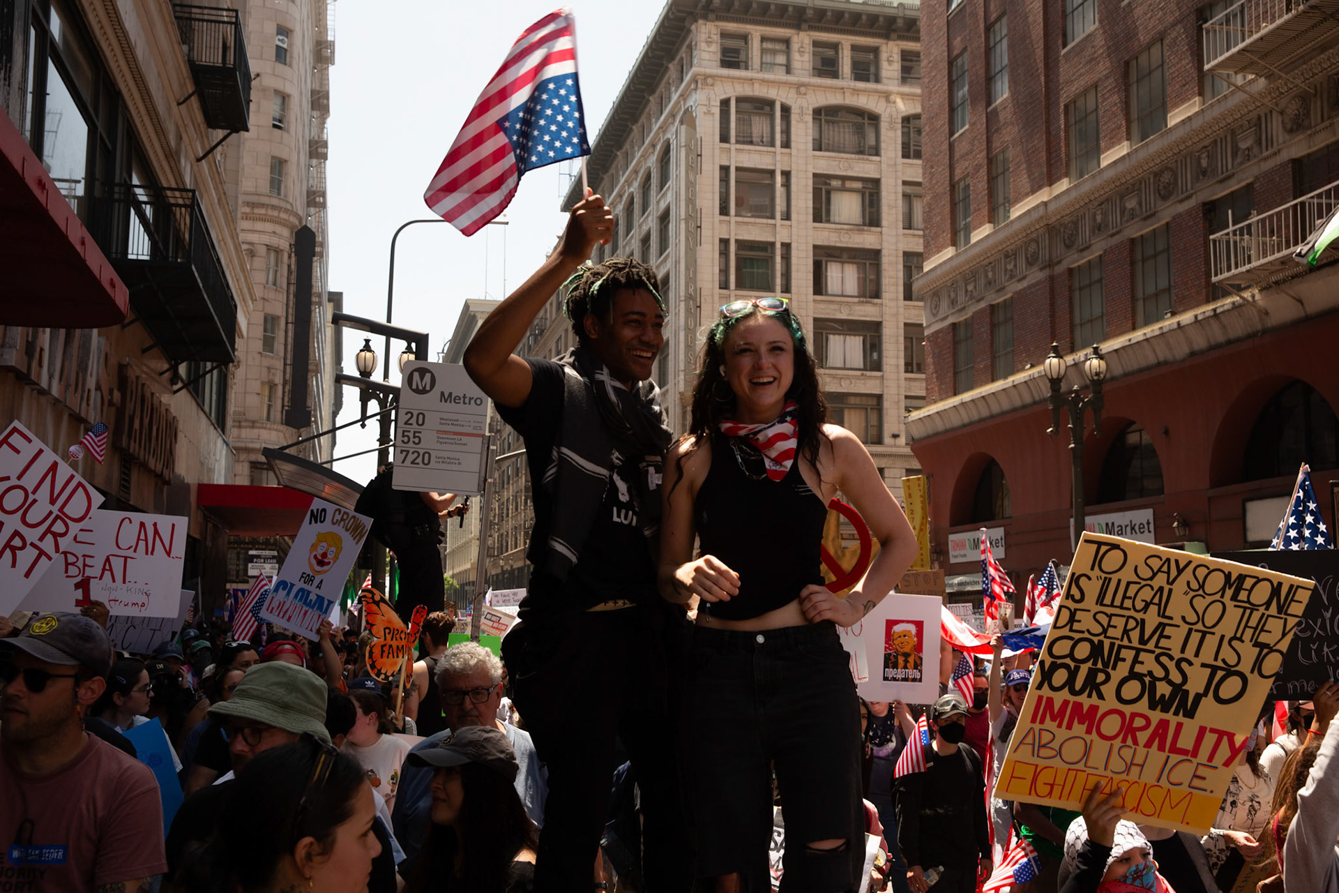 Demonstrators march against the Trump Military Parade and immigration raids by ICE in Downtown Los Angeles on June 13, 2025