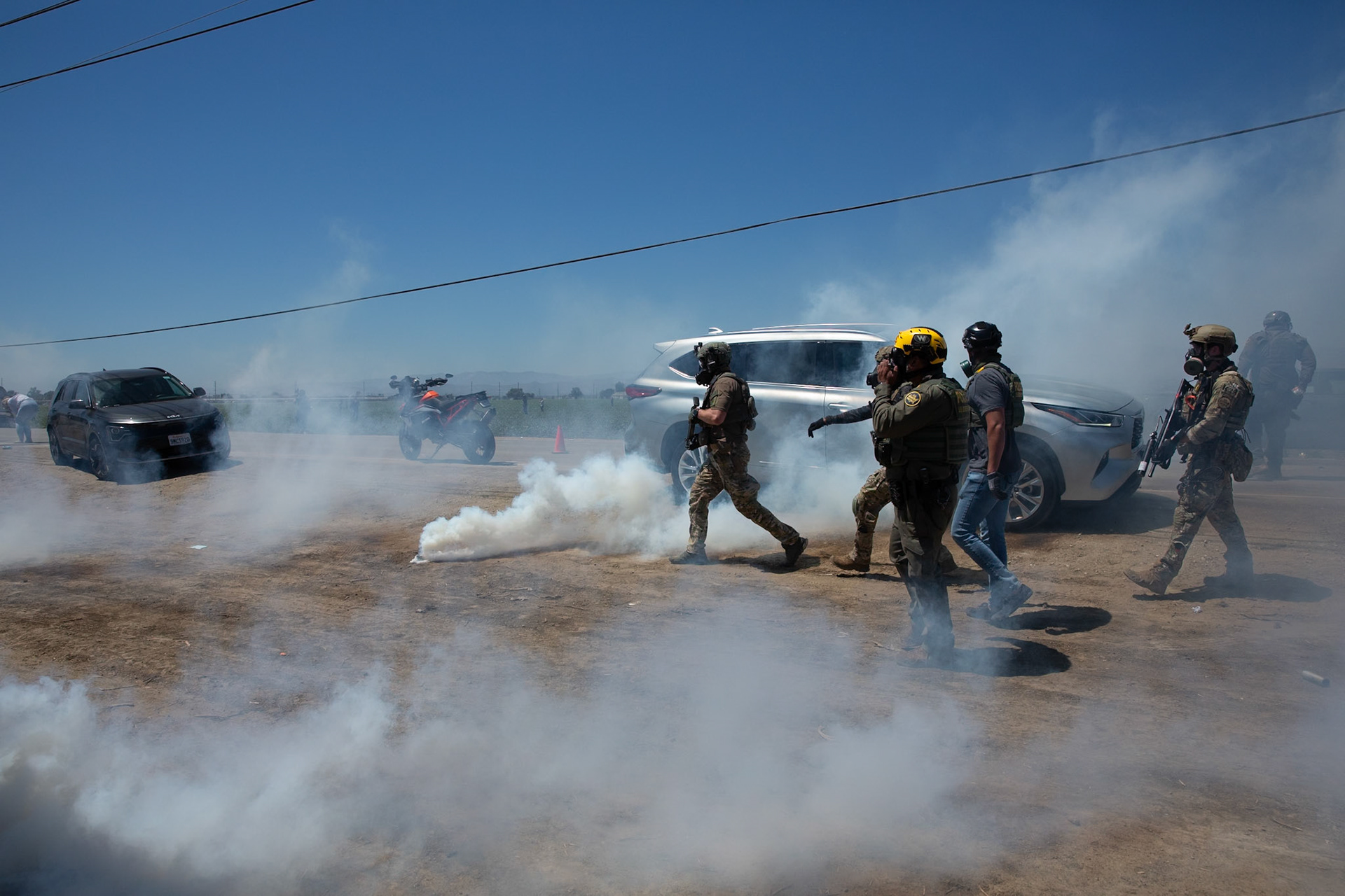 ICE and DHS agents fire tear gas at civilians gathered on a farm. DHS agents from multiple subsidiaries conducts a mass raid at a farm in Camarillo, Calif. on July 10, 2025.