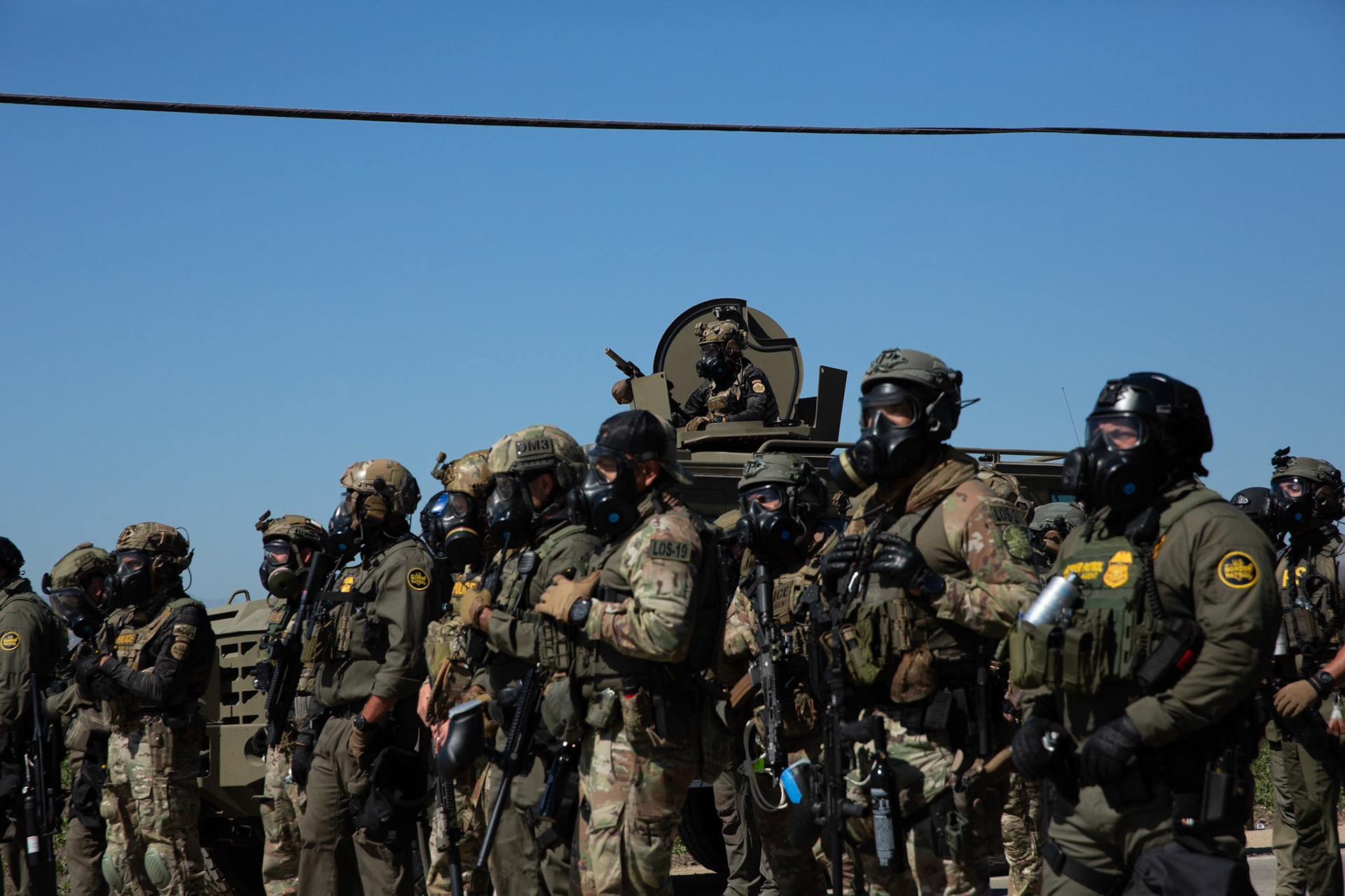 DHS agents from multiple subsidiaries conducts a mass raid at a farm in Camarillo, Calif. on July 10, 2025.