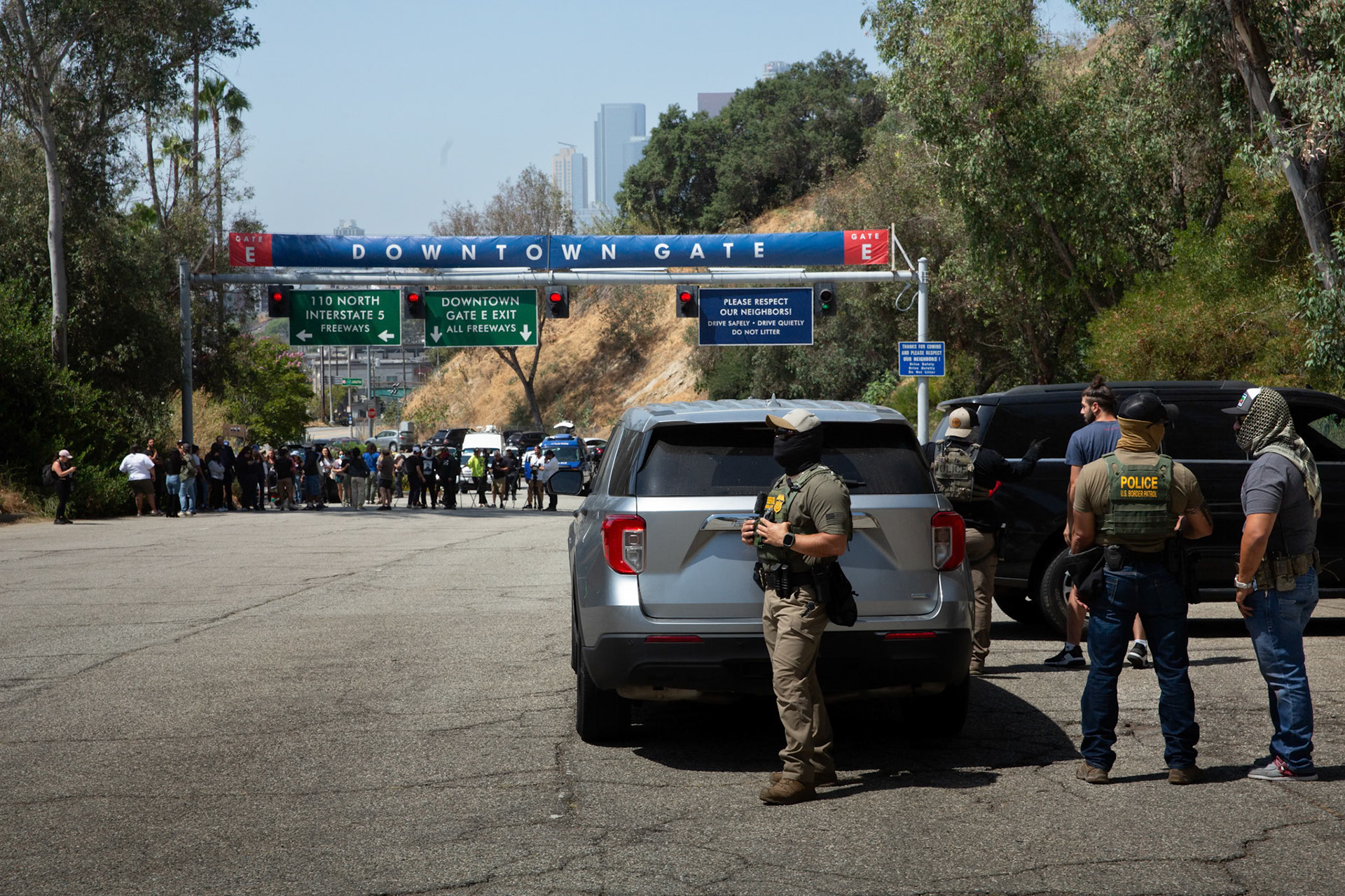 Border Patrol agents atr trapped at Gate E of the Dodgers Stadium in Los Angeles, Calif. while attempting to set up a staging area oon June 19, 2025. A statement from Dodgers Team News website during the stand off states that the Dodgers has denied ICE agents access to the stadium. The Border Patrol agents pictured refuse to identify themselves but says they do not have anyone detained. Dodgers Stadium employees at the gate says they have not helped immigration agents and the stadium policy does not allow immigration agents on the property.