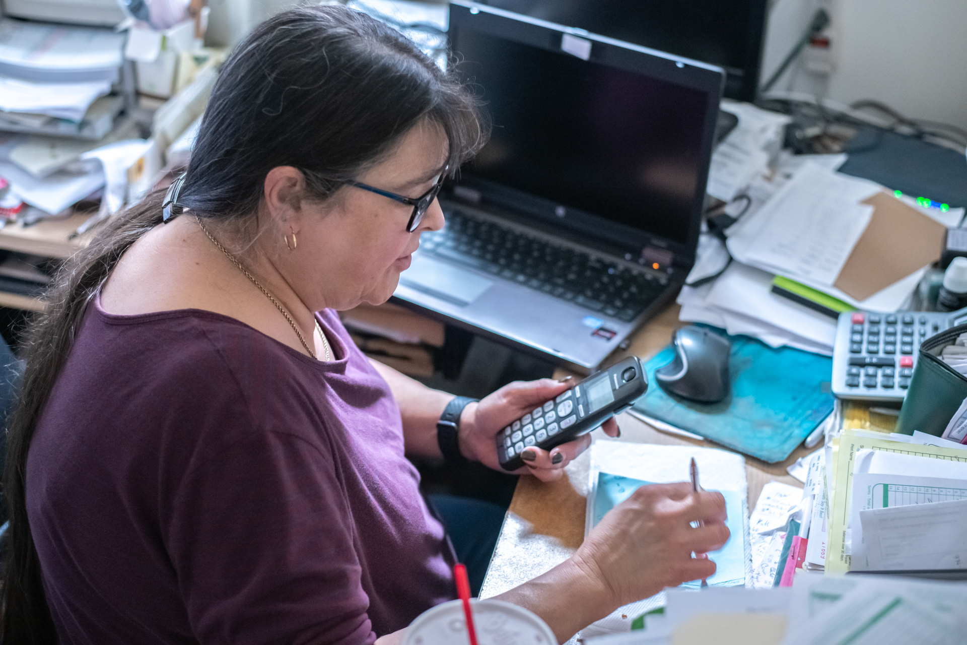 Becky Bevan takes an order over the phone at Always In Bloom Florist in Archdale, N.C. on November 25, 2020.