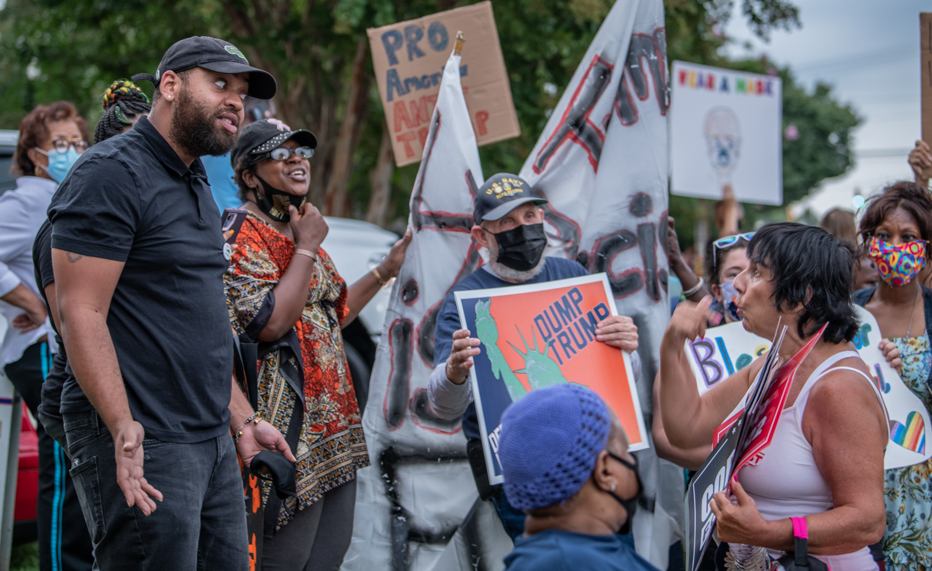 Anti-Trump protesters and Trump supporters verbally clash outside of a Trump rally at the Smith-Reynolds Airport in Winston-Salem on September 8, 2020.
