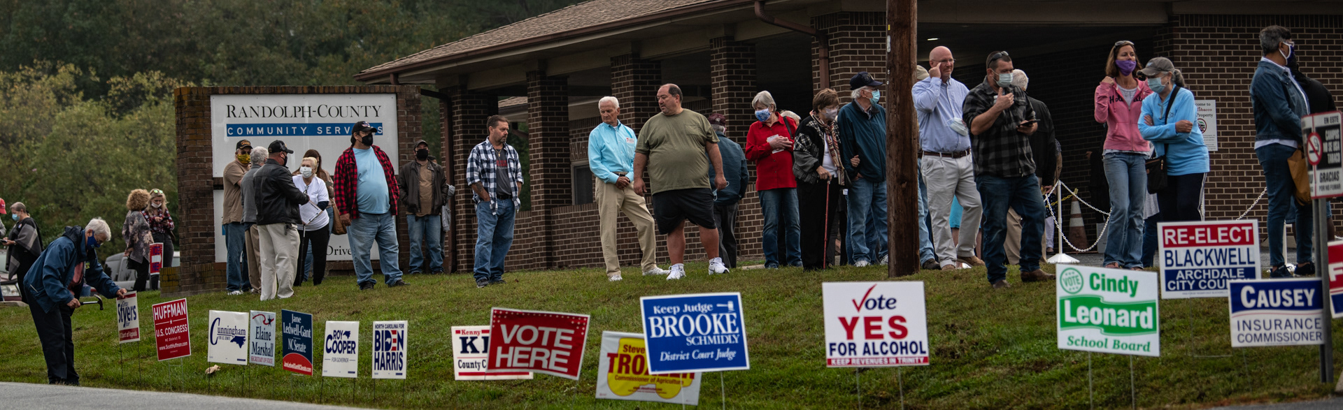 Citizens of Archdale and surrounding areas wait outside of the Randolph-County Community Services building in Archdale, N.C. for early voting that begins on October 15, 2020 in North Carolina.
