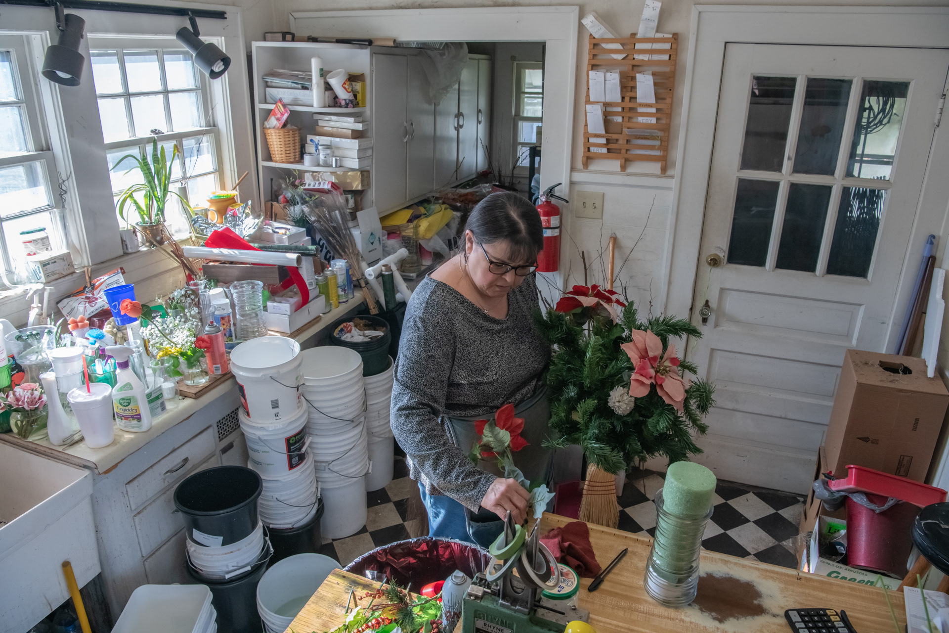 Becky Bevan refreshes an arrangement for a past customer at Always In Bloom Florist in Archdale, N.C. on November 28, 2020.