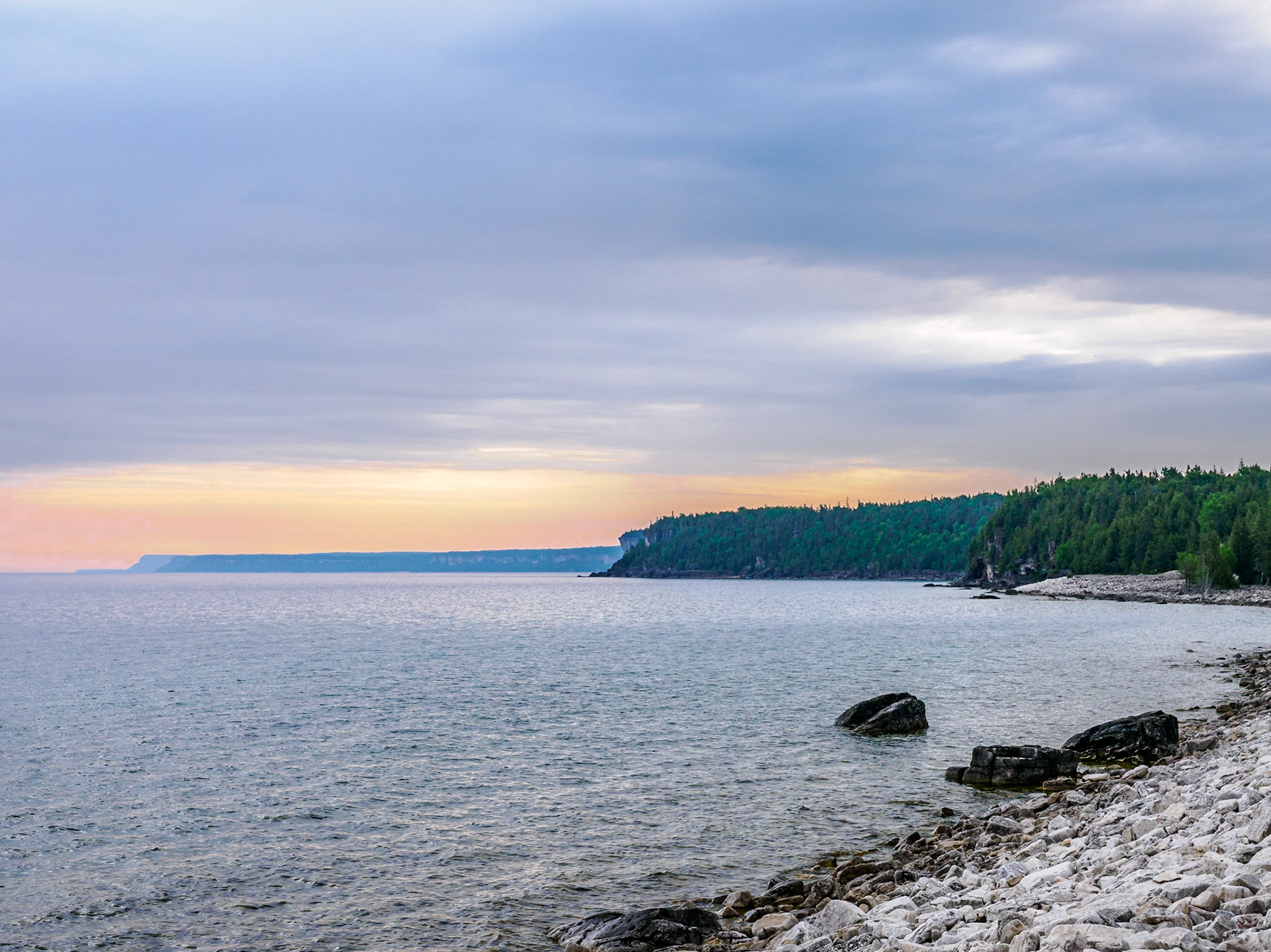View of Georgian Bay from the Bruce Trail. Smoke from the wildfires provided an orange sunrise-look to the sky even though sunrise was actually 2-1/2 hours earlier.