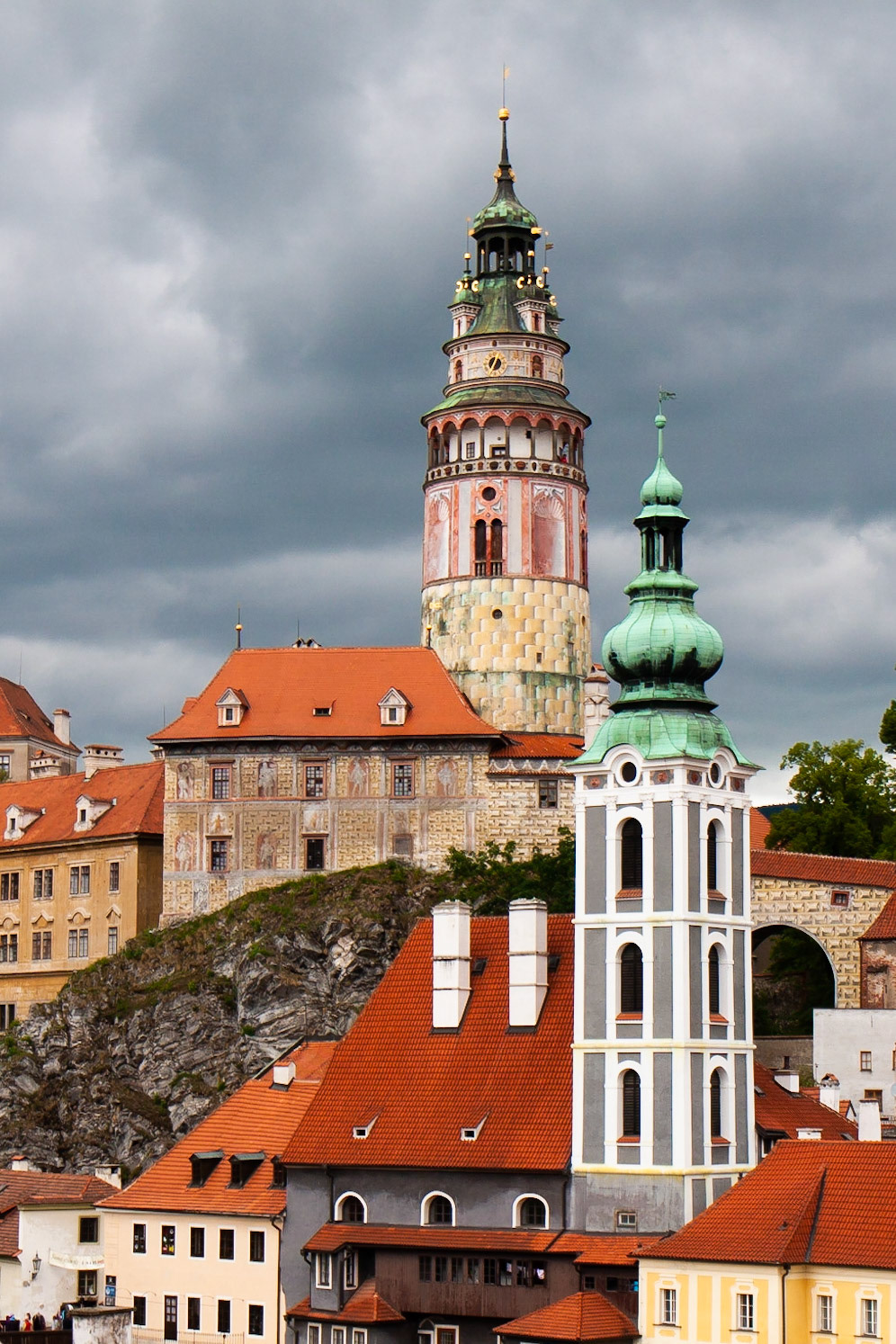 of the Cesky Krumlov castle. The grey tower with the green top is part of the former Church of St. Jost