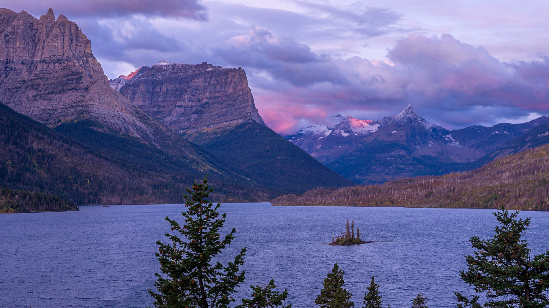 Sunrise from Wild Goose Island Overlook, looking west toward the peaks on the Continental Divide running through Glacier National Park