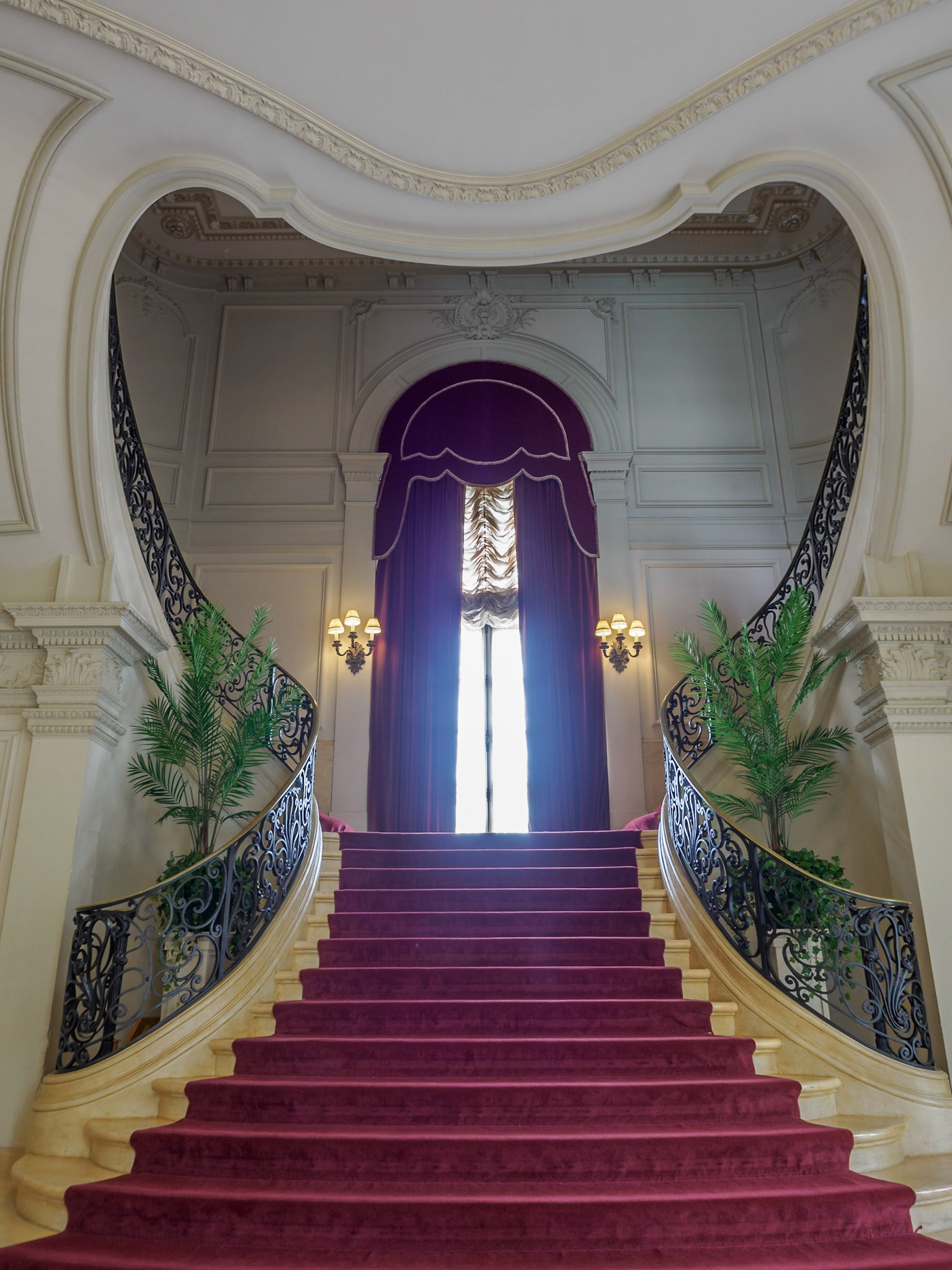The Grand Staircase was designed for women to be seen. They would walk upstairs to deposit their wraps and then turn around to float down the sweeping staircase.
