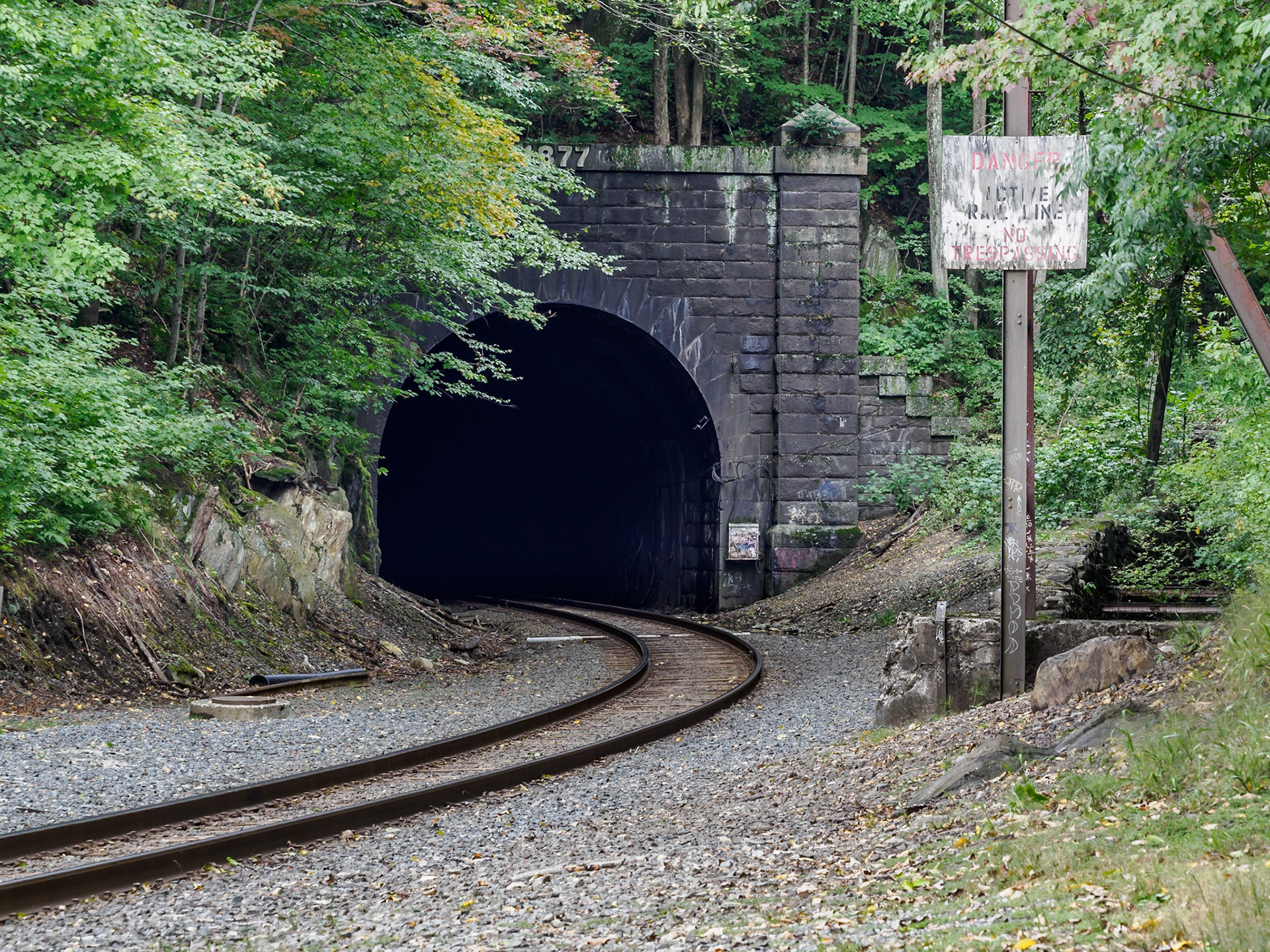 The eastern end of the Hoosac Tunnel in Florida, Massachusetts. It is a railroad tunnel through the Northern Berkshire mountains, ending 4 3/4 miles to the west in North Adams, Mass. It took a good 25 years to build; from 1851 to 1876.