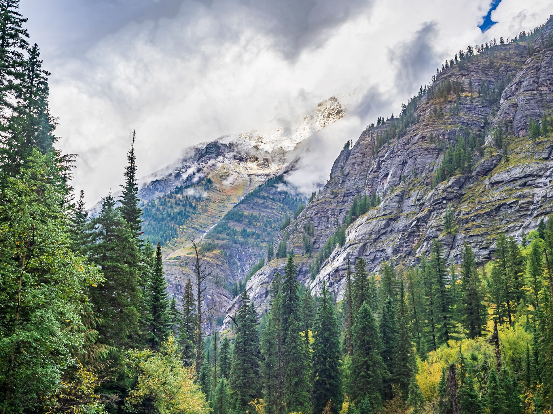 Looking back toward the trail, clouds were breaking up and patches of blue sky were making an appearance.