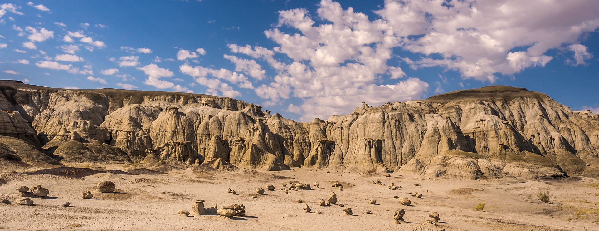 The rock fans begin to assemble as the Bisti Choir, in their flowing robes, gets ready to perform