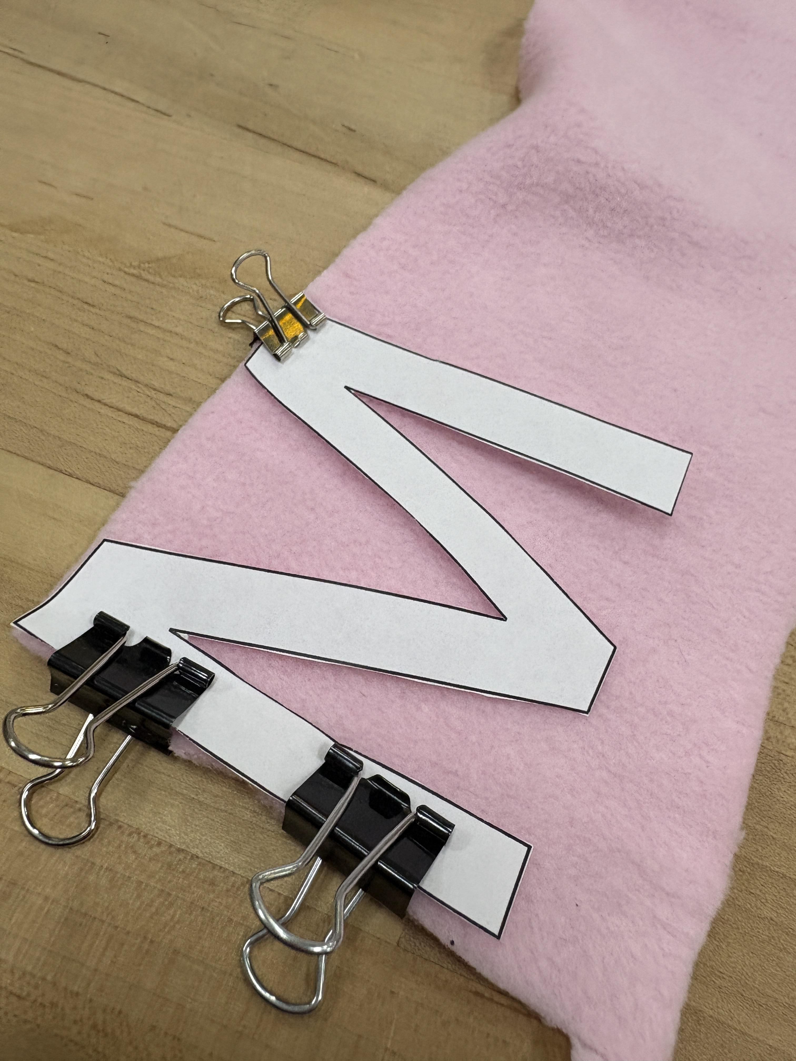 To make sure it stays in place, I used clips or what I call clippies to hold the paper letter in place.