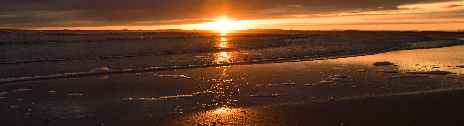 Winter Sunrise across Dornoch Beach and Dornoch Firth