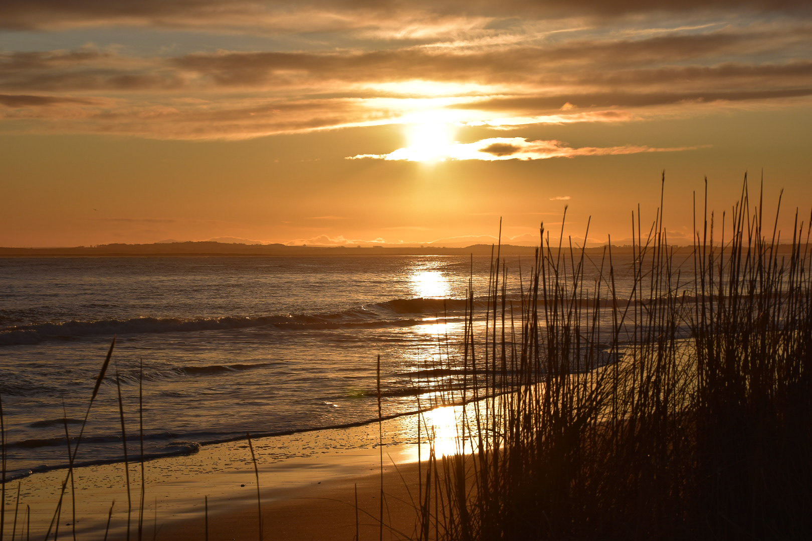 Winter Sunrise across Dornoch Beach and Dornoch Firth