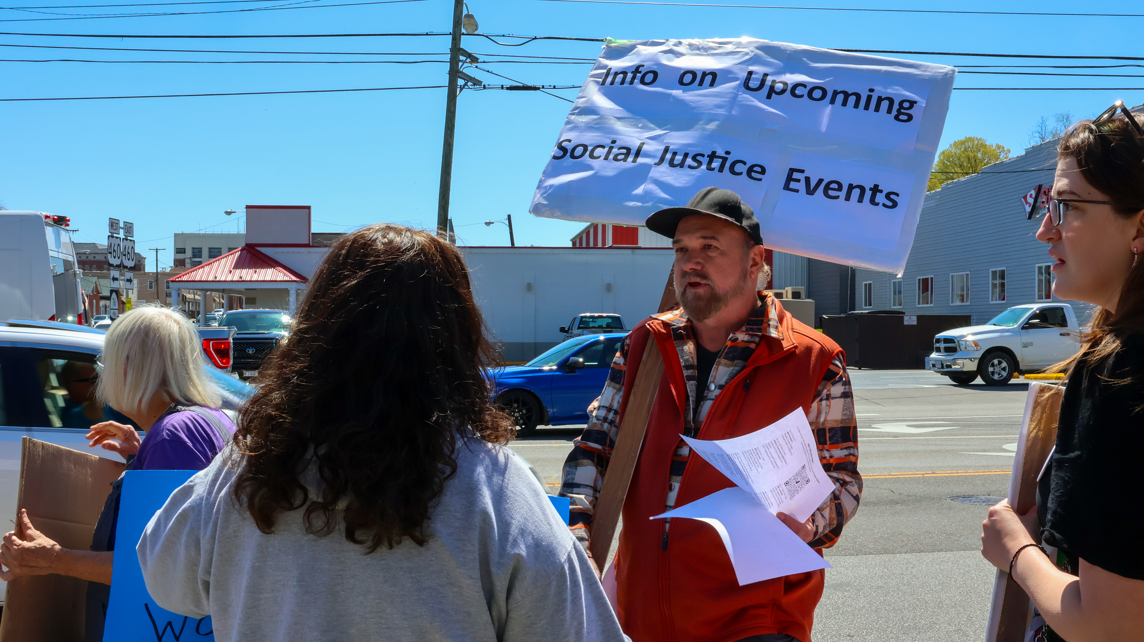 Mark Benson PhD, speaking to protesters to get them to sign up for the New River Valley Citizen Activist Network event (NRV CAN): (Jackie Mitchell/JMC 4114)