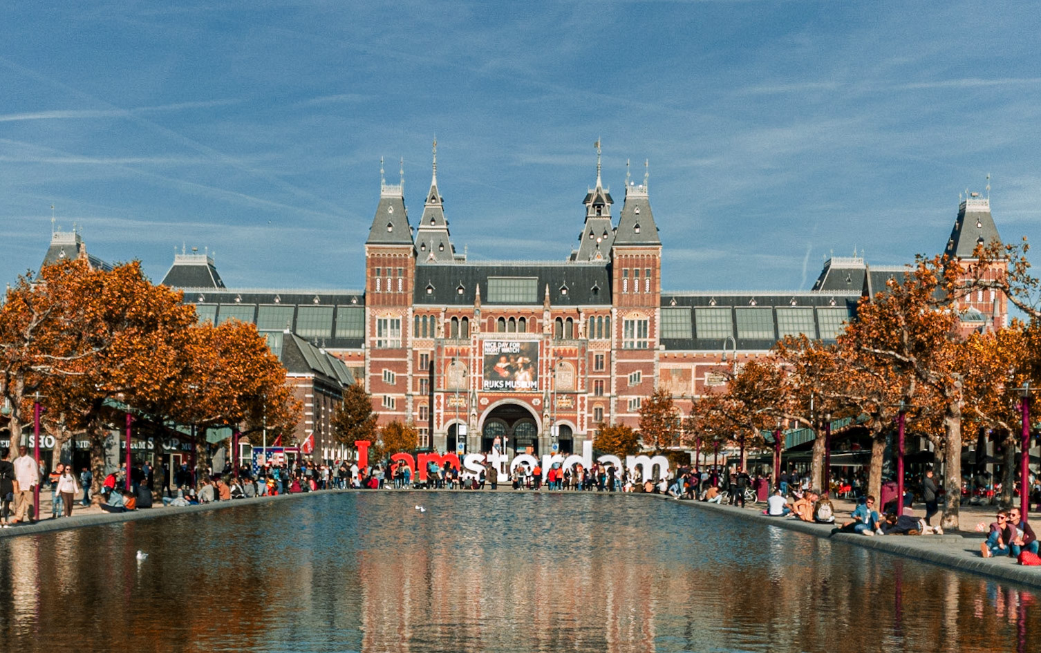 Pond in the Museum Quarter with the Riksmuseum in the background in Amsterdam, Netherlands