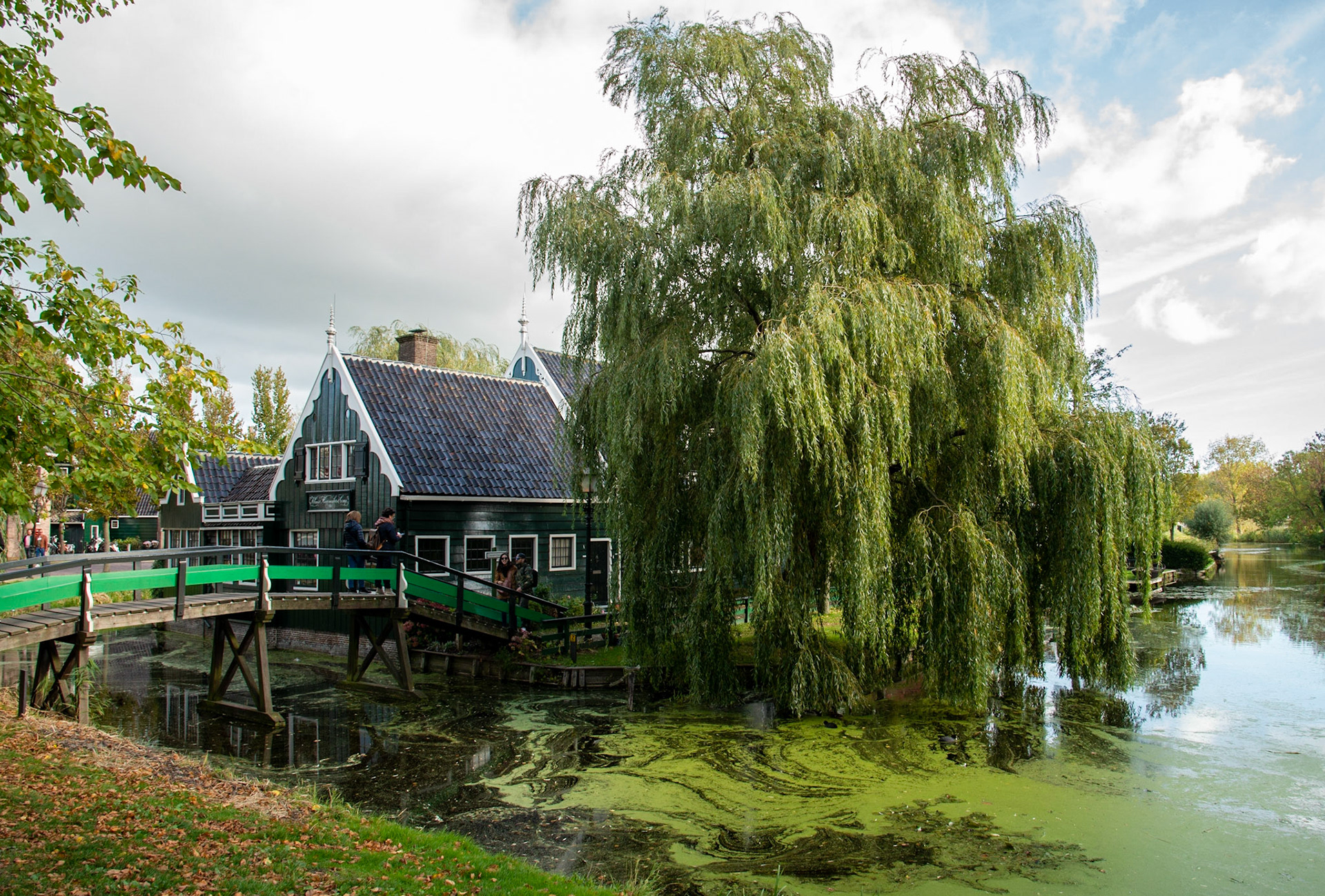 Shop and bridge on one of the small canals in Zaanse Schans, Netherlands