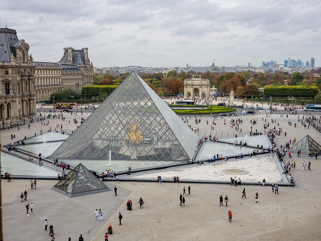 "Louvre View" The pyramids viewed from a window inside the museum.