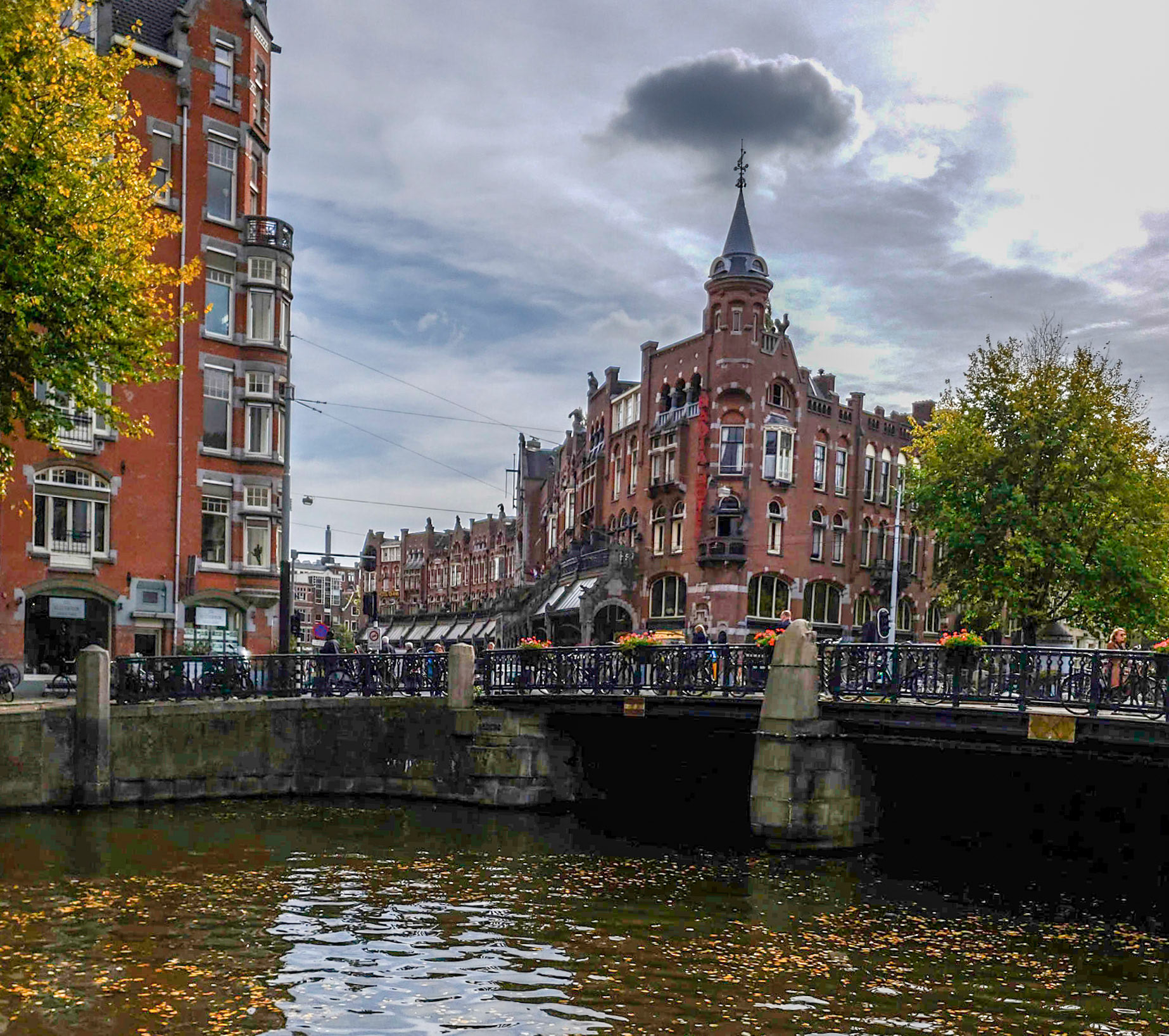 Unusual cloud over the Nadia Hotel along Keizersgracht, the Emperor’s Canal, in Amsterdam, Netherlands