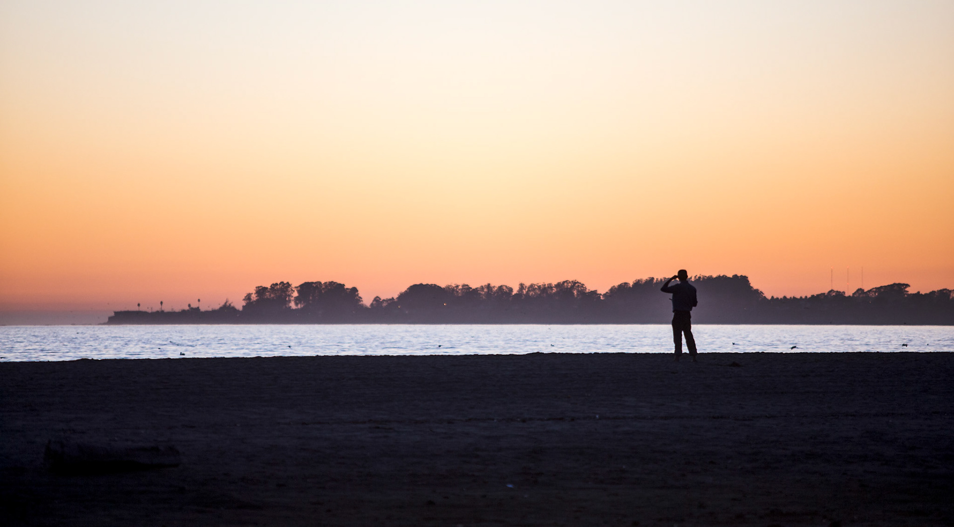 Man on Seacliff State Beach