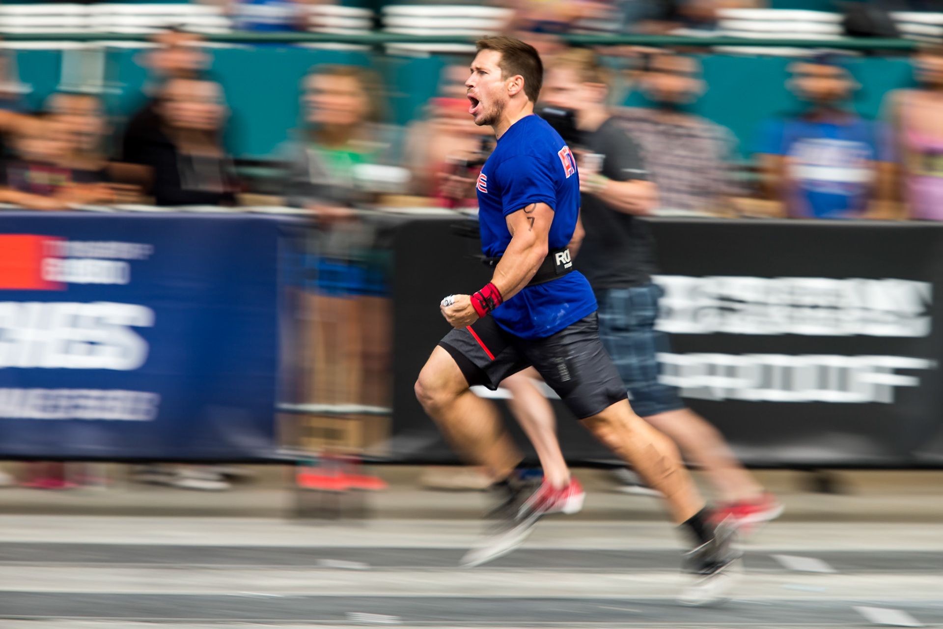 Dan Bailey celebrates winning the first event of the 2015 Reebok CrossFit Games California Regional at the Del Mar Fairgrounds in Del Mar, CA.