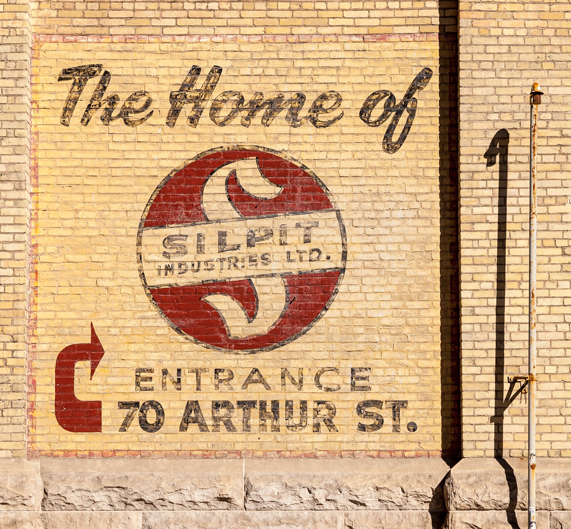Painted sign "The Home of Silpit Industries Ltd.", Arthur Street, The Exchange District, Winnipeg, Manitoba, Canada