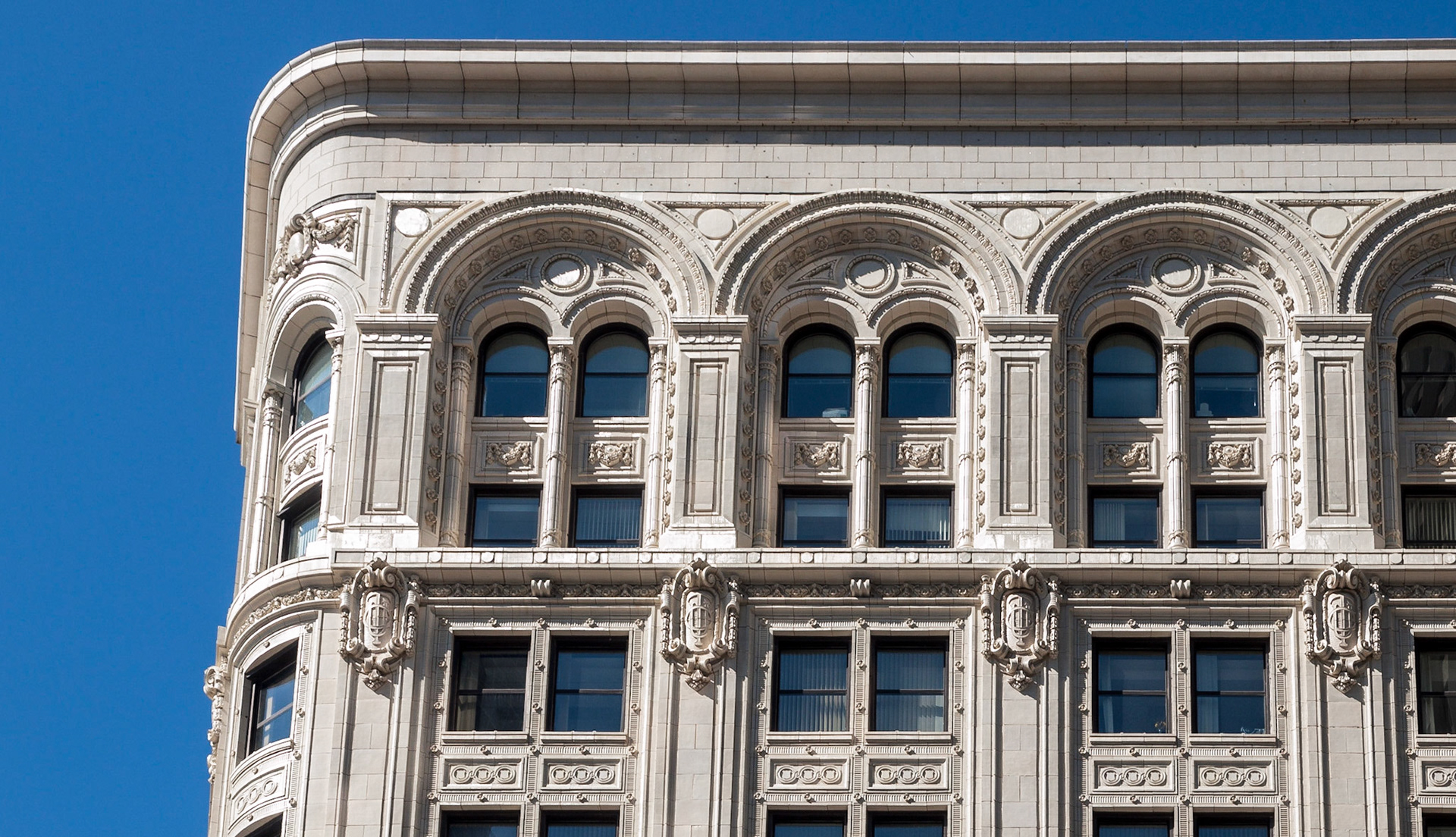 Ornate carved-stone windows in The Exchange District, Winnipeg, Manitoba, Canada