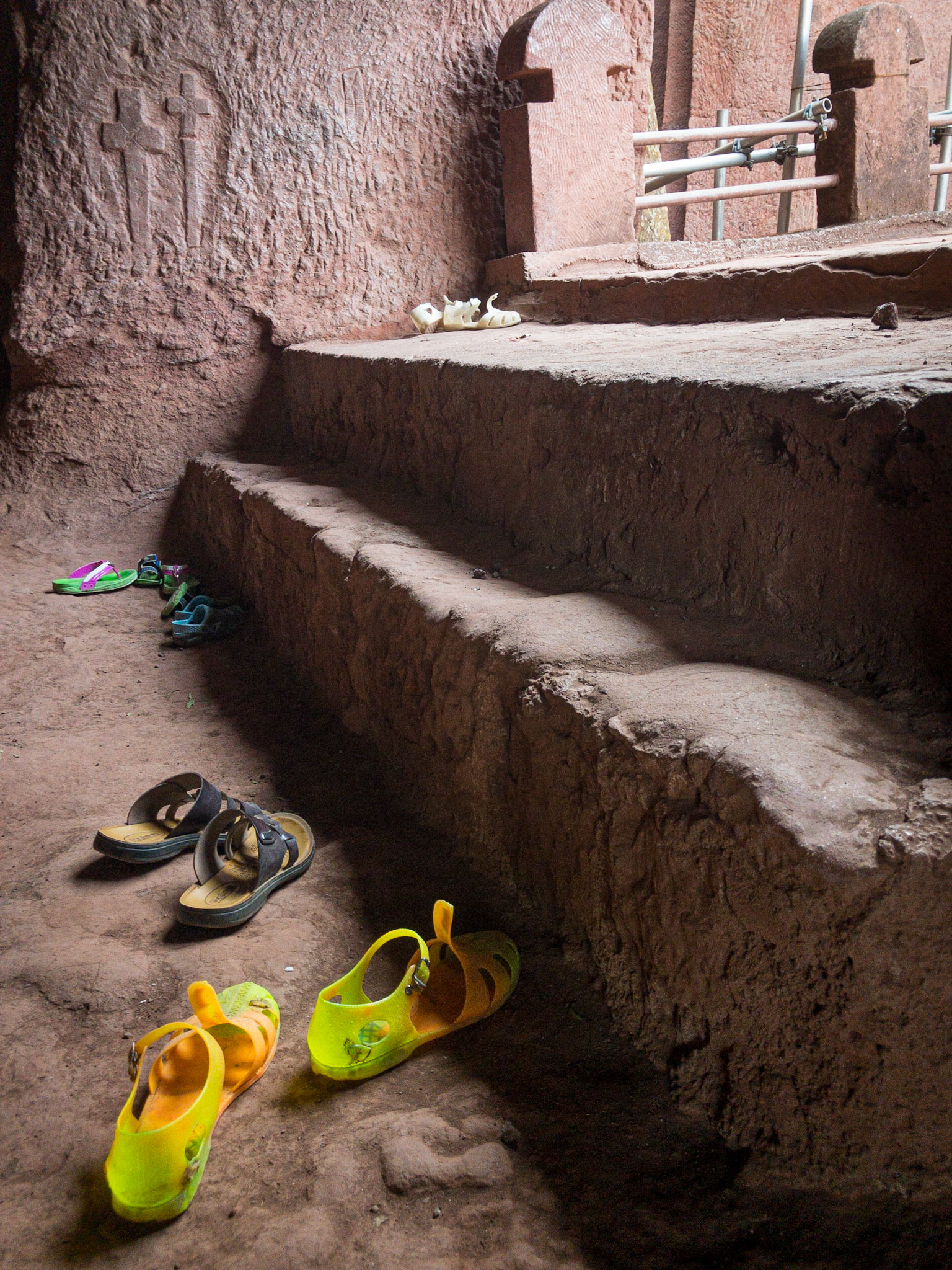 Shoes are left outside the stairway to the rock-hewn church of Biete Gabriel Rufael, Lalibela, Ethiopia