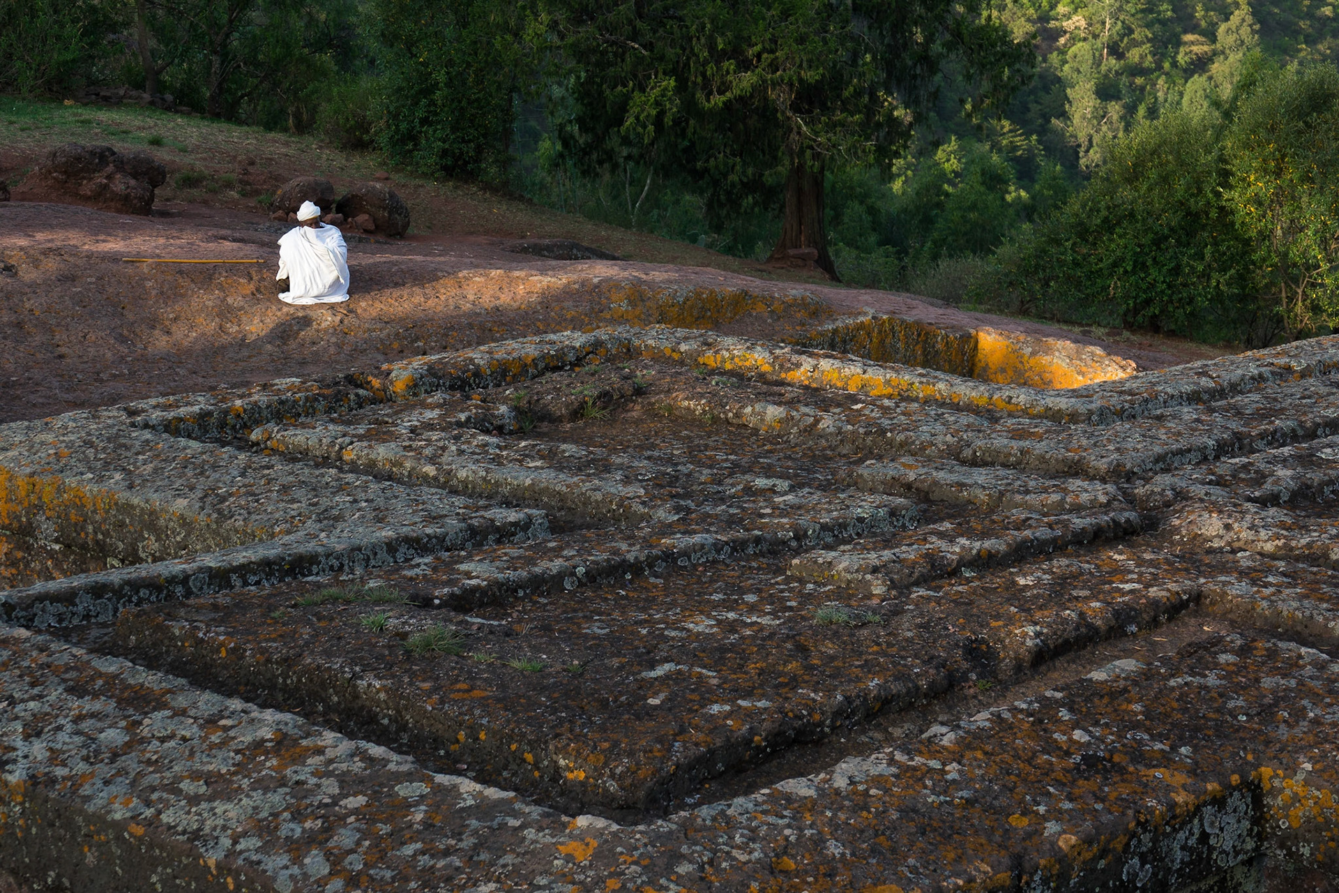A lone parishoner prays during morning mass at Biete St. Giyorges, Lalibela, Ethiopia