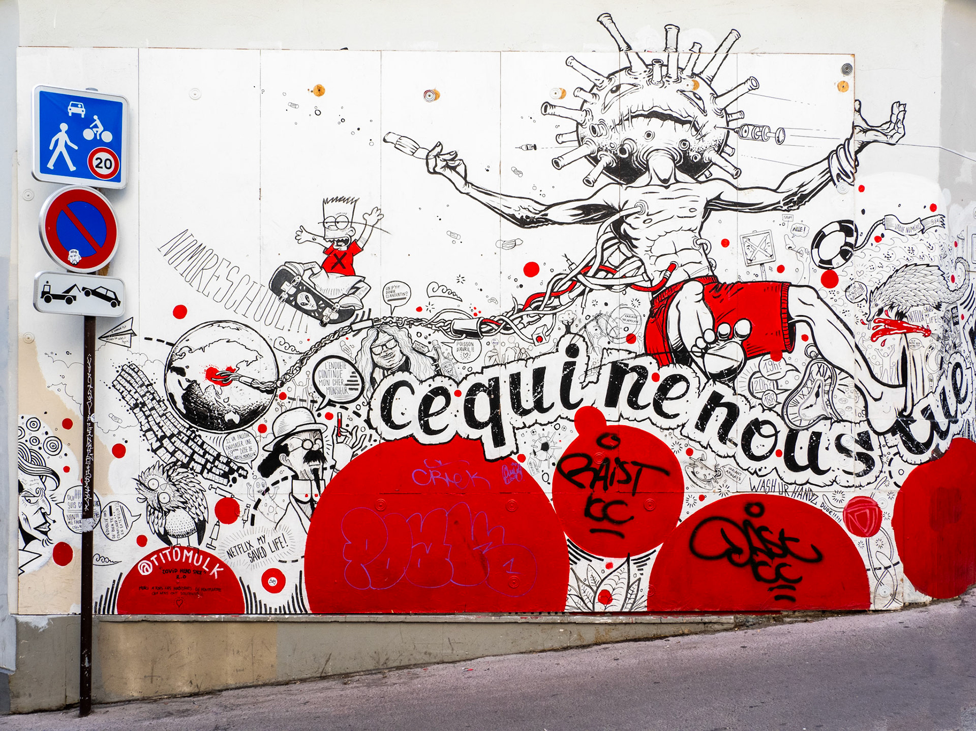 In this stark black, white and read street art, the message is clear: What doesn't kill us" ("ce qui ne nous tue") by @titomulk