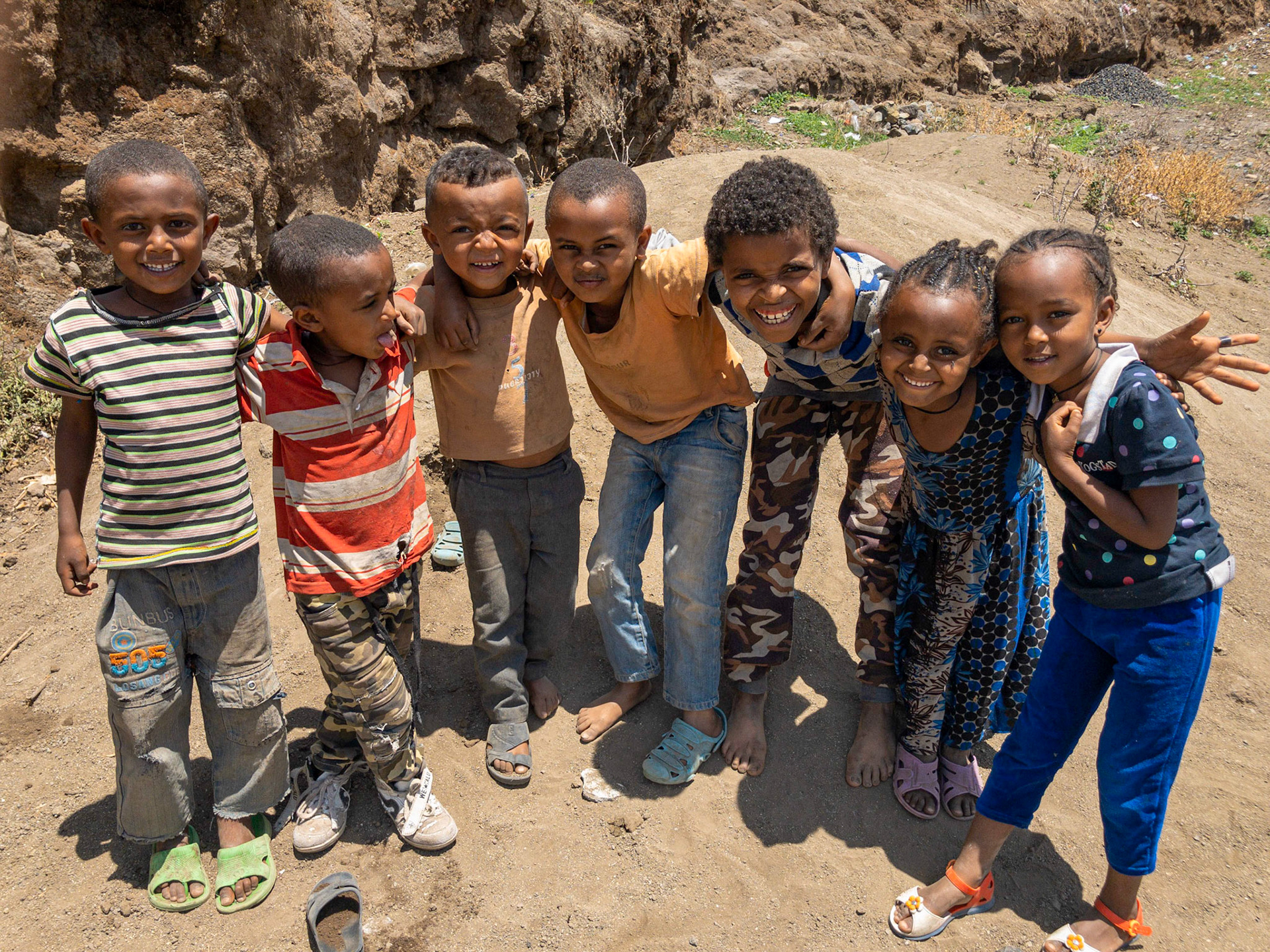 Gang of kids playing together, like kids all over the world, Laibela