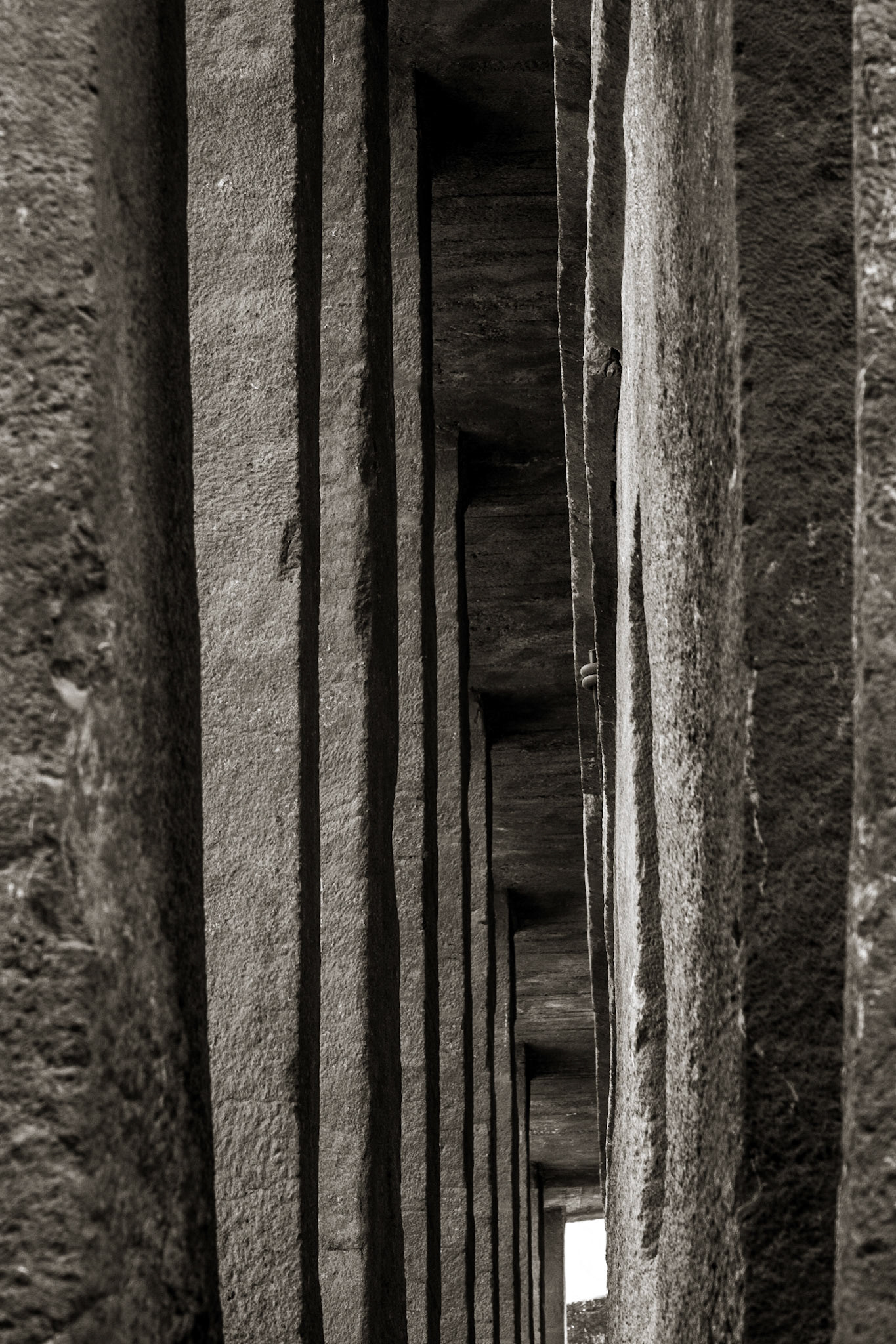 Rock-hewn pillars surround Biete Medhane Alem, Lalibela, Ethiopia